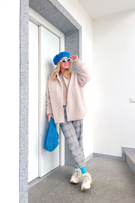 Blue Beret. Fashion Blogger Girl by Style Blog Heartfelt Hunt. Girl with blond hair wearing a blue beret, teddy jacket, white cat-eye sunglasses, chunky sweater, plaid pants, blue statement bag, blue socks and faux fur sneakers. #colorfuloutfit #colorfulstyle #colorfulfashion #colorfullooks #fashionfun #cutefalloutfit #fallfashion2022 #falllookbook #fitcheck #dailylooks #dailylookbook #contentcreator #microinfluencer #discoverunder20k