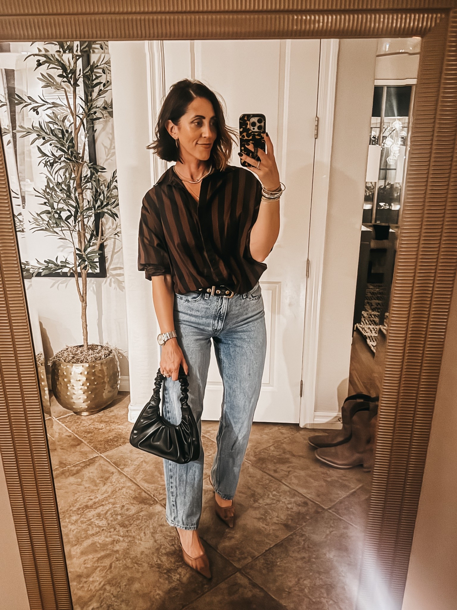 Brown + black forever! 🖤🤎 wearing size small in the striped top & size 27 jeans

*linked a few black & brown tops — so chic (especially the satin one 😍)

- my mesh mules are 46% off right now!! - I did an 8

Fall style, fall outfit idea, casual style, jeans, dad jeans, chic style

#LTKOver40 #LTKSaleAlert #LTKFindsUnder50