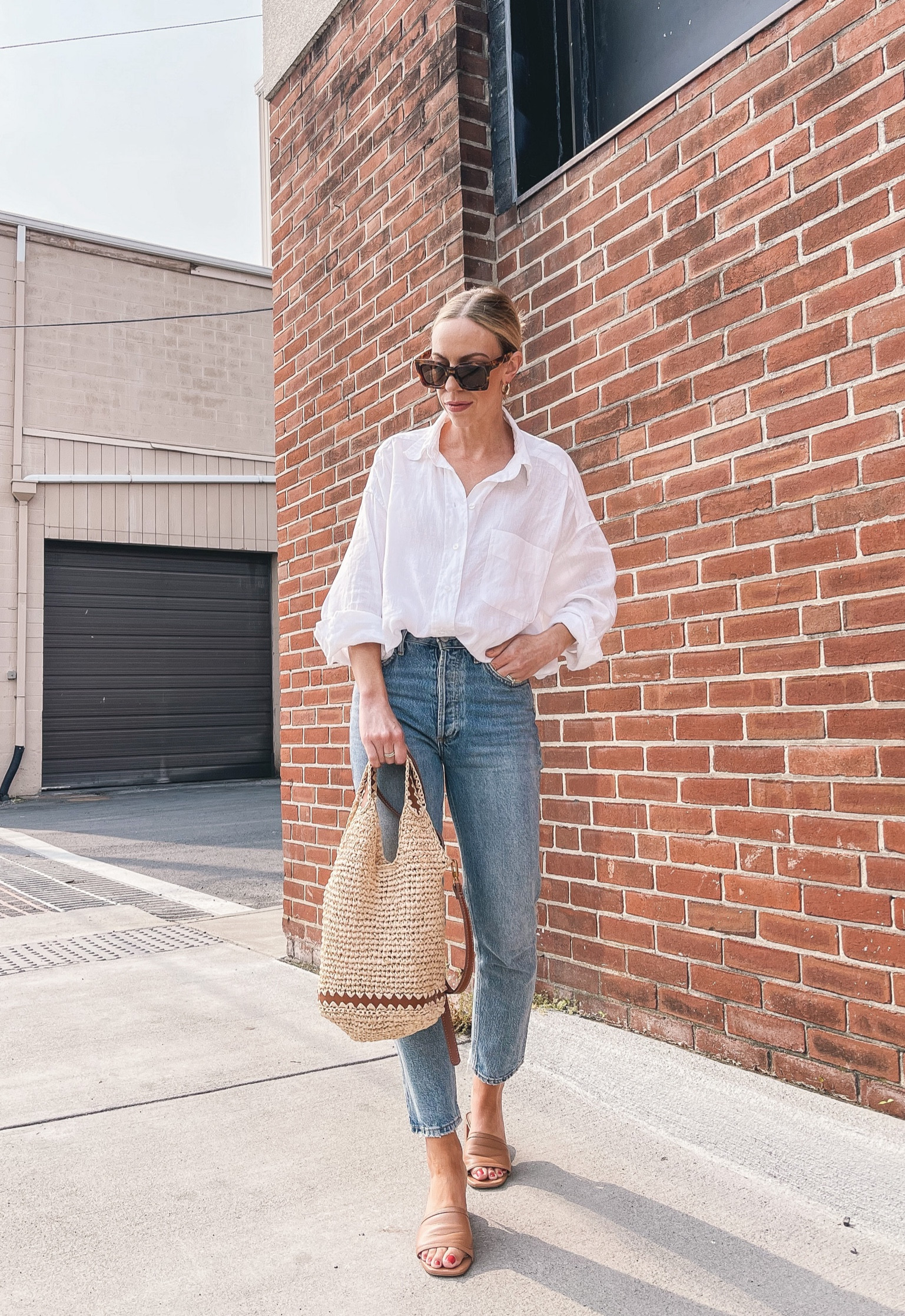 Classic summer outfit idea, white linen shirt, straight leg jeans, AGOLDE jeans, straw tote bag, mule sandals 

#LTKsalealert #LTKstyletip #LTKunder100