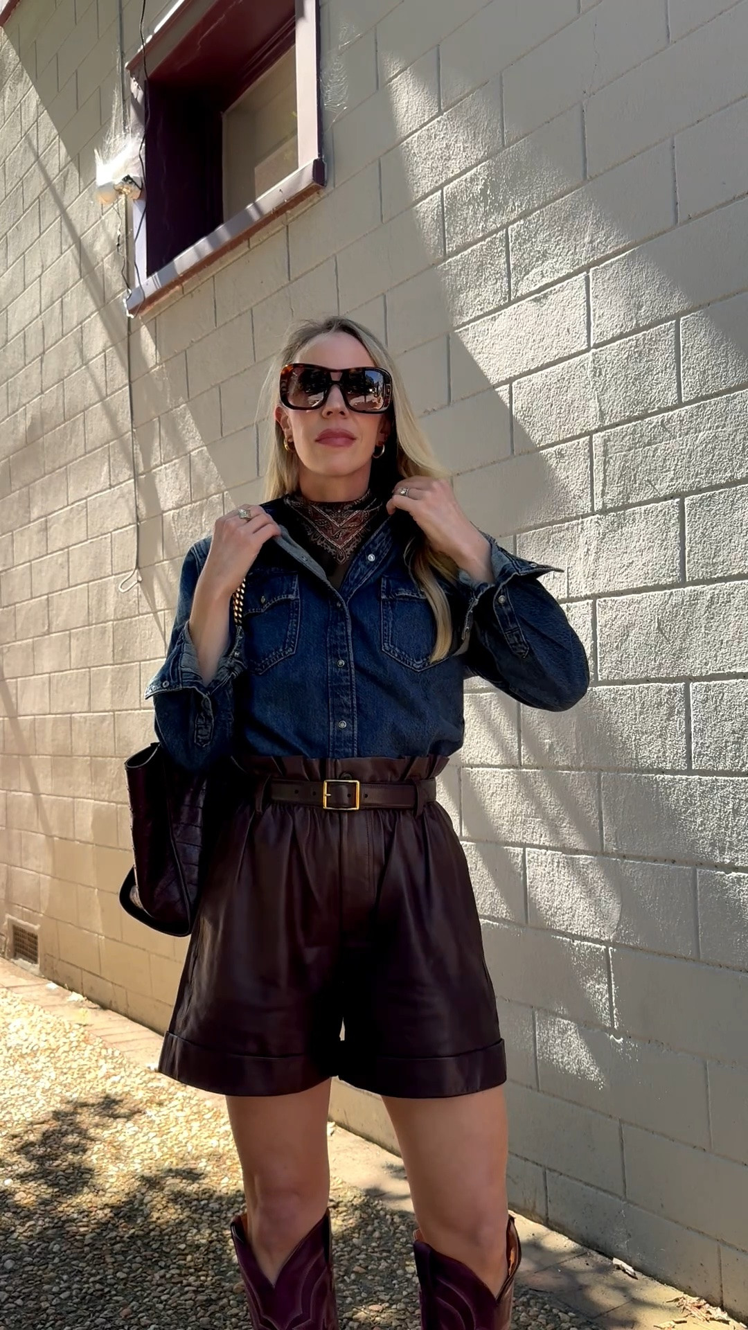 Western fall outfit with @levi denim shirt, paisley print silk scarf, brown leather shorts, @Tecovas burgundy cowboy boots

#LTKSeasonal #LTKOver40 #LTKSaleAlert