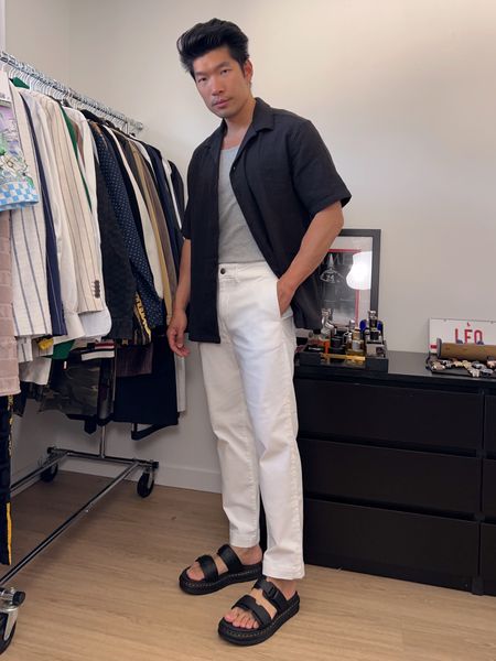 Men’s casual summer outfit: Button shirt with a tank top underneath paired with white jeans and black sandals 

#LTKstyletip #LTKSeasonal #LTKmens