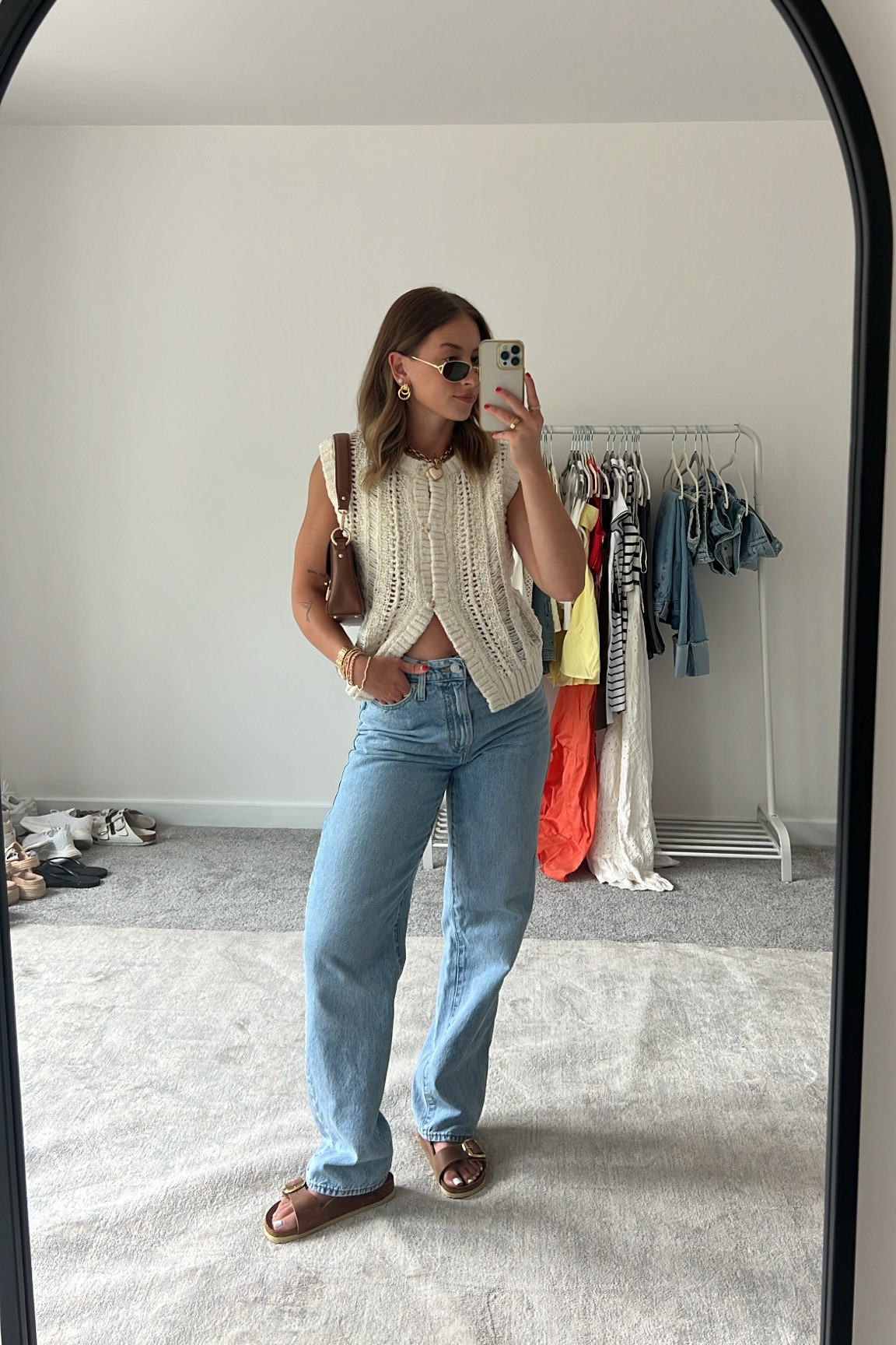 6/5/24 Casual jeans outfit for summer 🫶🏼 Summer outfit inspo, summer fashion trends, summer trends, summer outfits, baggy jeans, Birkenstock sandals, chunky jewelry, fashion accessories, fashion trends, trendy summer outfits, sweater top, vest top, vest top outfits 
