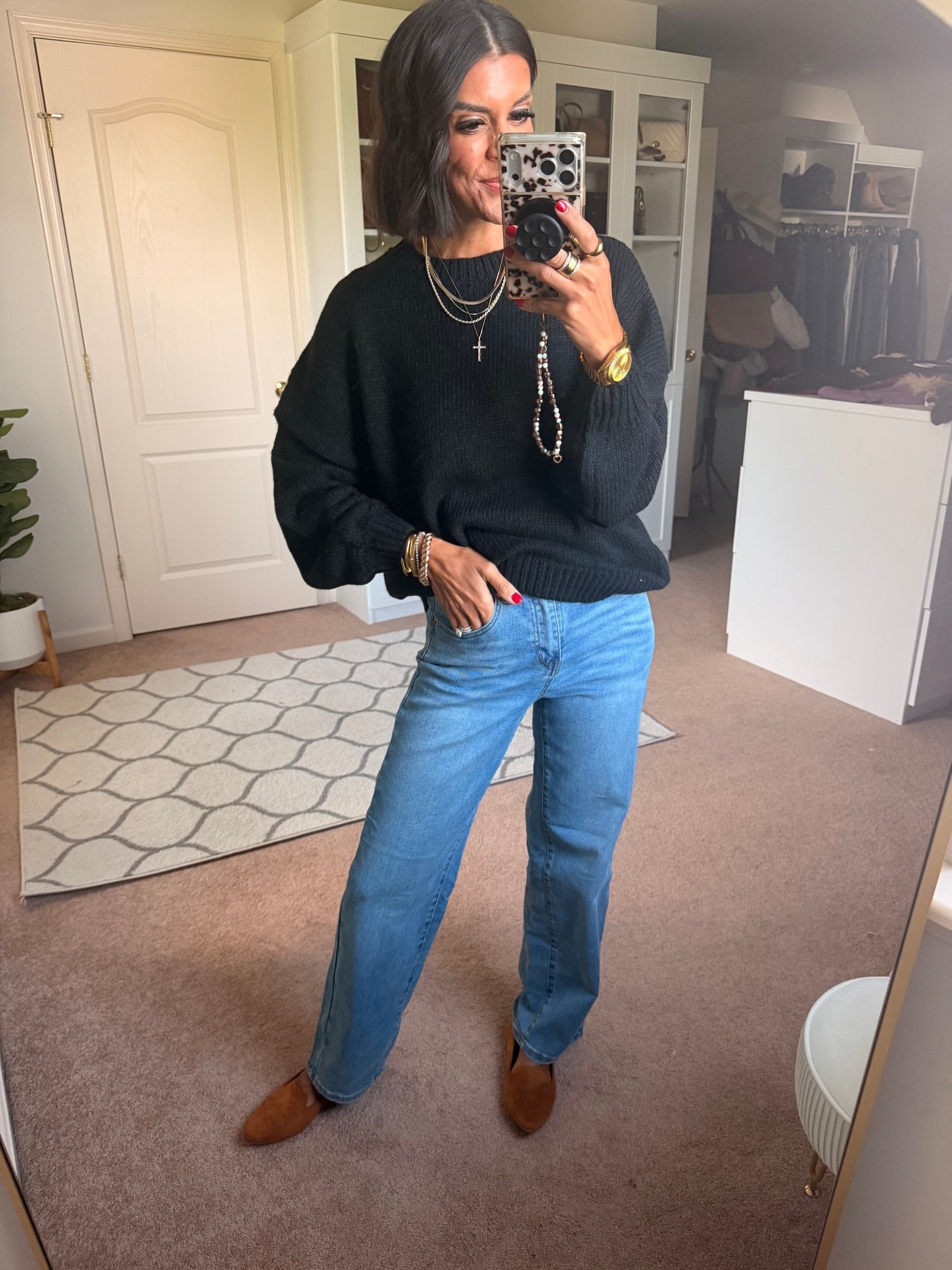 Size small in sweater size 4 in jeans