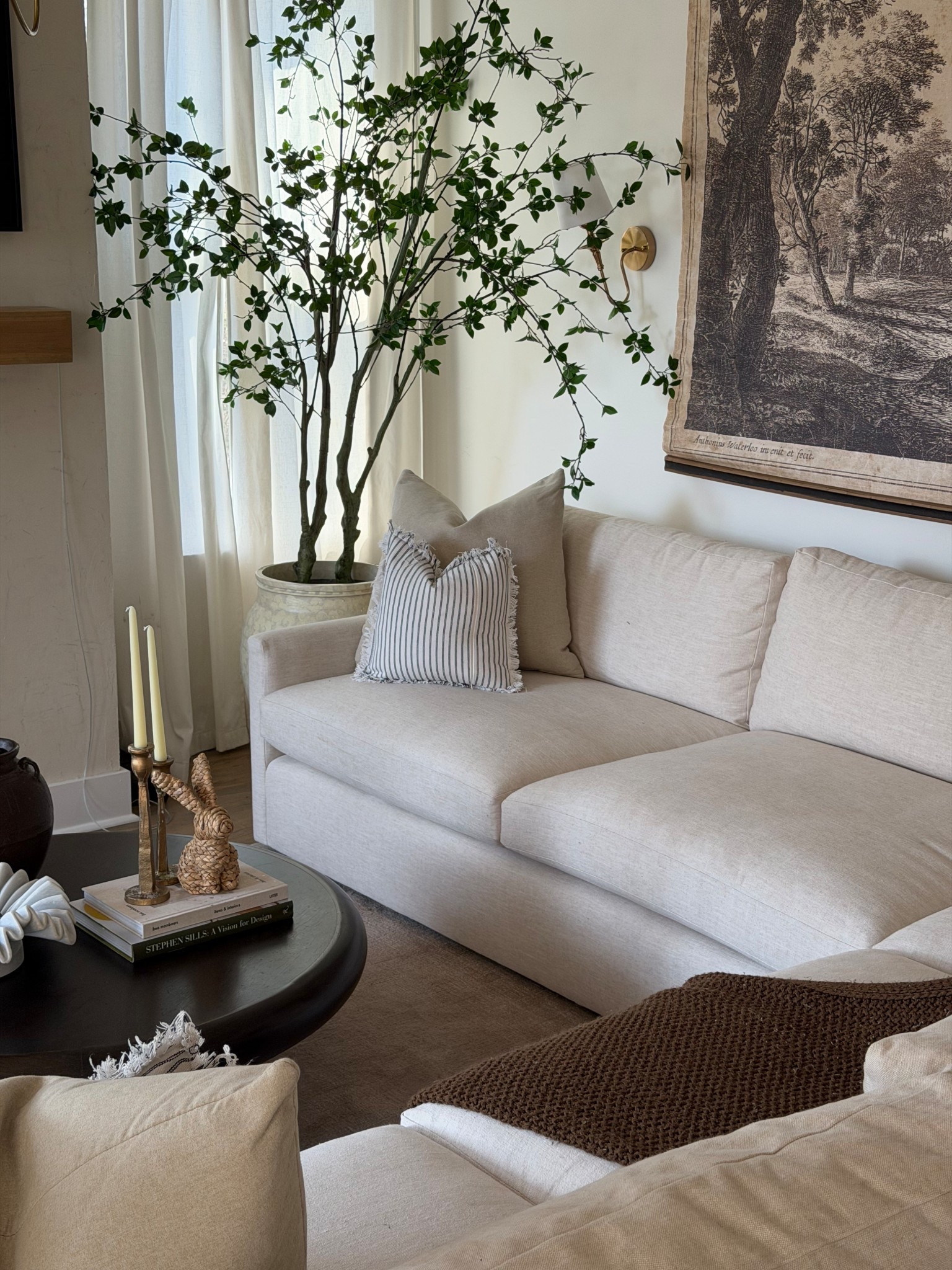 My living room decor details!! My couch is in the medium deep in color cleary cashmere & there are two of the faux trees in the pot for a fuller look!

#LTKHome #LTKSeasonal