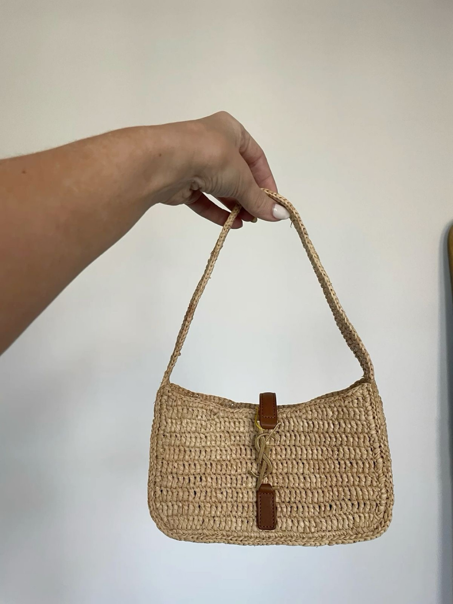 Elevate your summer style with the Yves Saint Laurent woven handbag. Perfect for any casual outing, this luxurious piece brings a touch of elegance and sophistication to your wardrobe. #YSL #SummerFashion #LuxuryHandbag

#LTKSwim #LTKStyleTip #LTKItBag