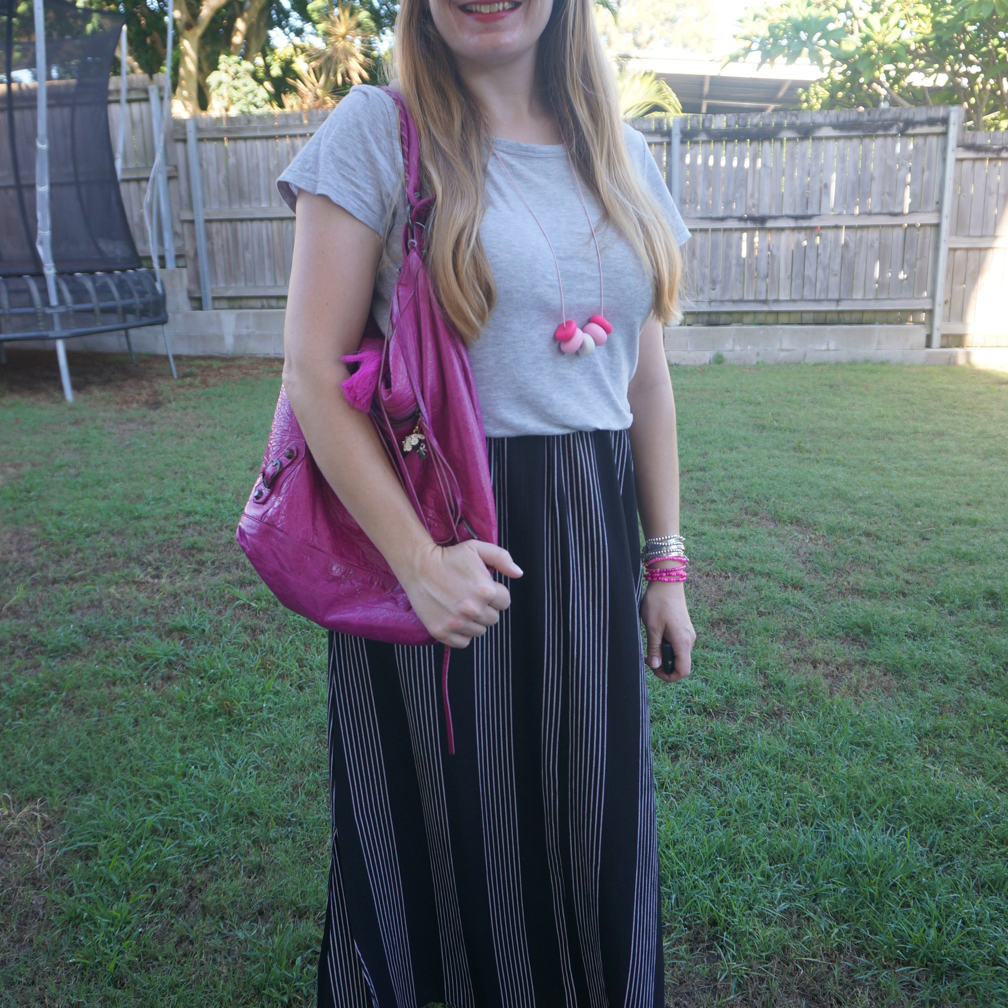 Grey tee with black and white vertical striped maxi skirt and magenta pink Balenciaga day bag 💕 

#LTKbag #LTKautumn #LTKaustralia
