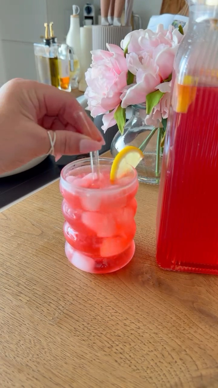 Amazon find that’s equal parts pretty + practical ✨

These ribbed glass pitchers instantly make iced tea, lemonade, infused water—or even plain water—look a little more elevated. 🤍 I love the classic striped glass, gold-tone lids, and the fact that you get two 68 oz pitchers in the set. Perfect for keeping one in the fridge and one ready for entertaining! 🍋🧊

They’re made from heat-resistant borosilicate glass, so they can be used for both hot and cold drinks.

#LTKHome #LTKSeasonal
