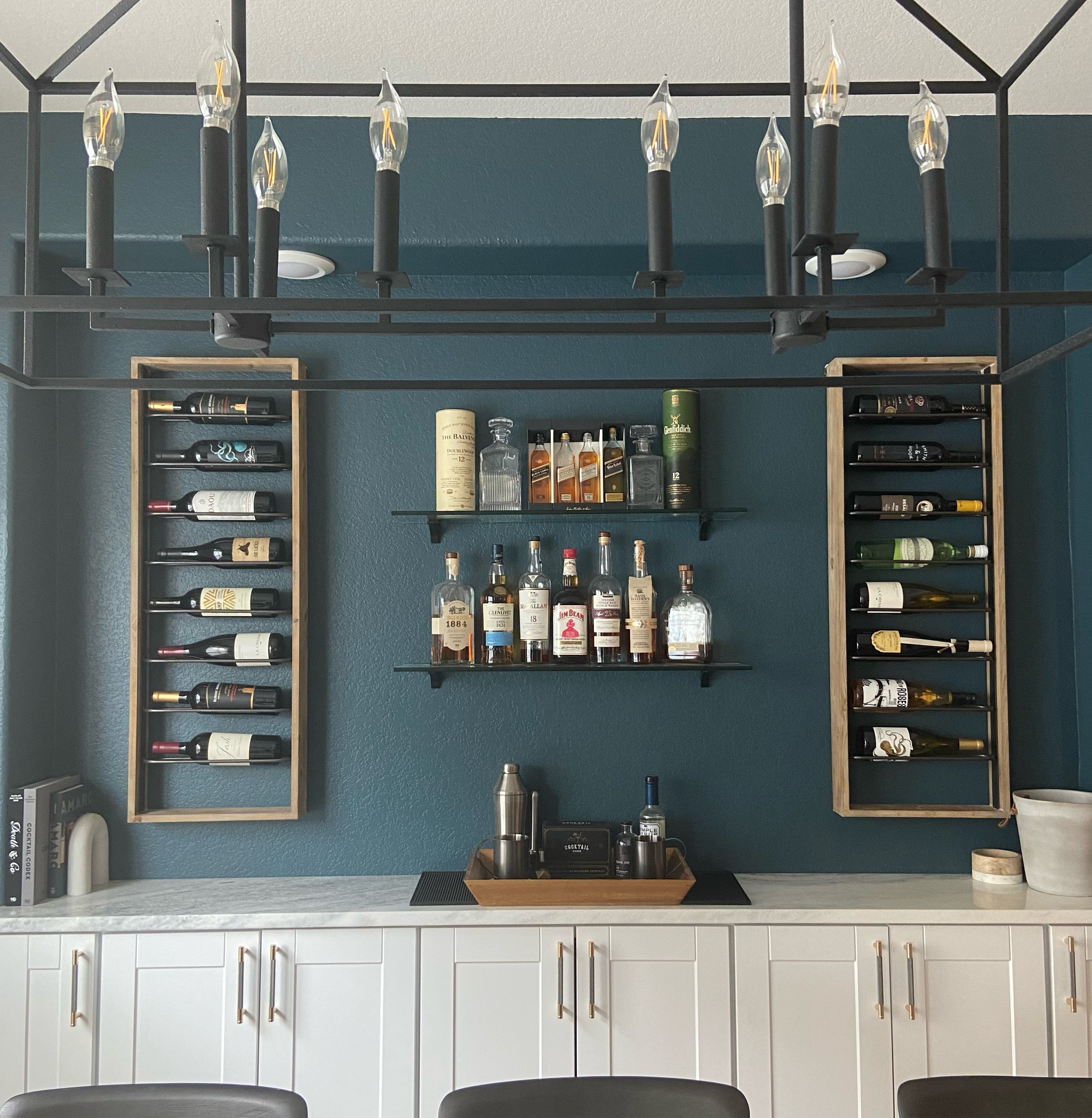 Our built in bar using ready to mount wall cabinets as a buffet table. 
#homebar #winerack #mensgiftidea #whitecabinets #diningroom

#LTKmens #LTKunder100 #LTKhome