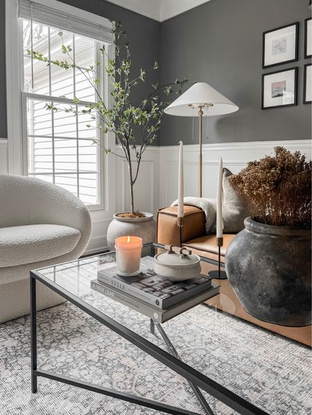 Neutral living room space in our office. I love this cozy nook for reading and getting work done. This accent chair is currently on sale too! 

#LTKFind #LTKsalealert #LTKhome