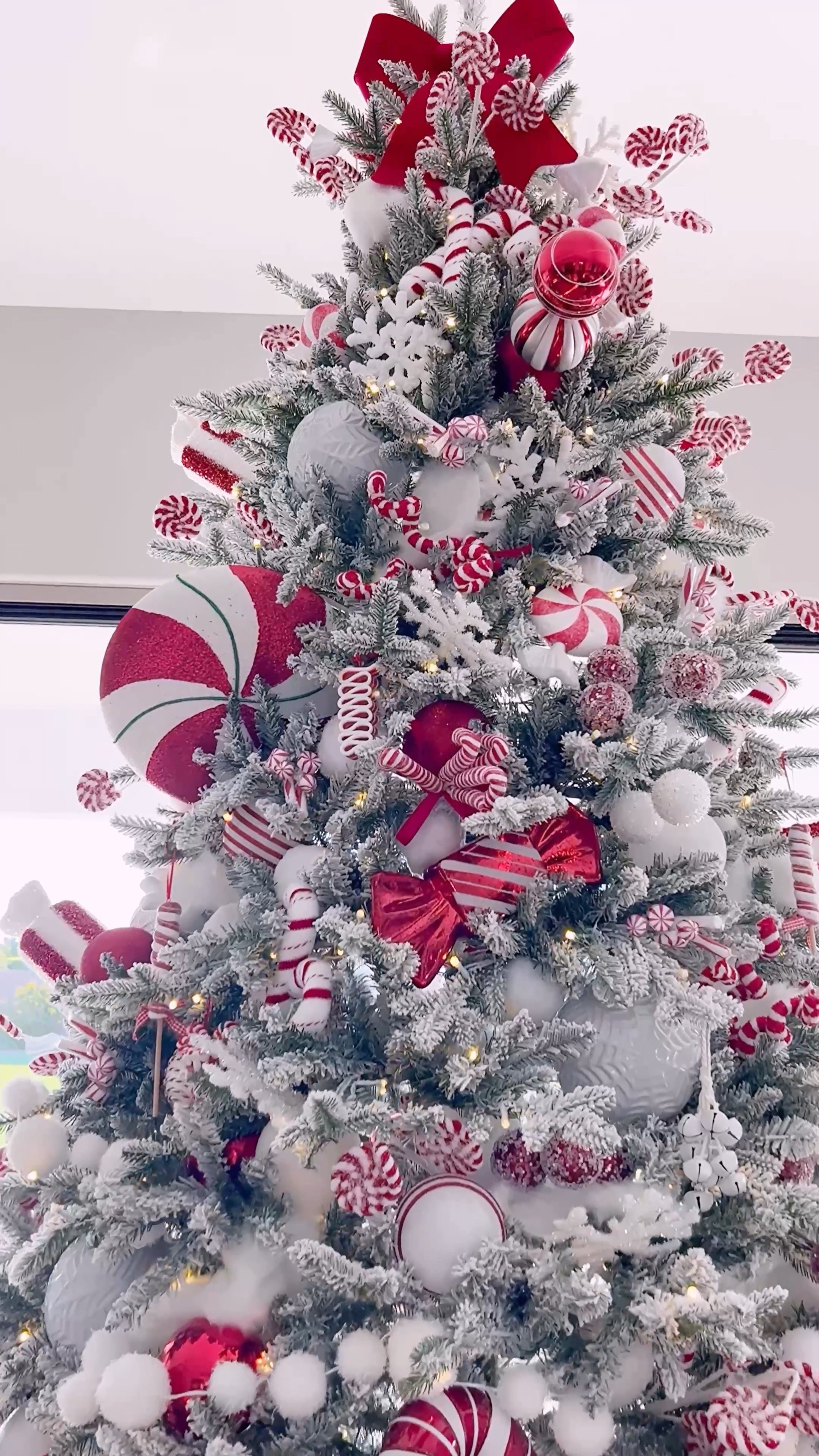 My sweet kitty is loving the cozy vibes under the snowy flocked branches of my Christmas tree, all decked out in red & white peppermint ornaments!

#christmastree #christmasornaments #homedecor #christmasinspo #Christmas

#LTKHome #LTKSeasonal #LTKHoliday