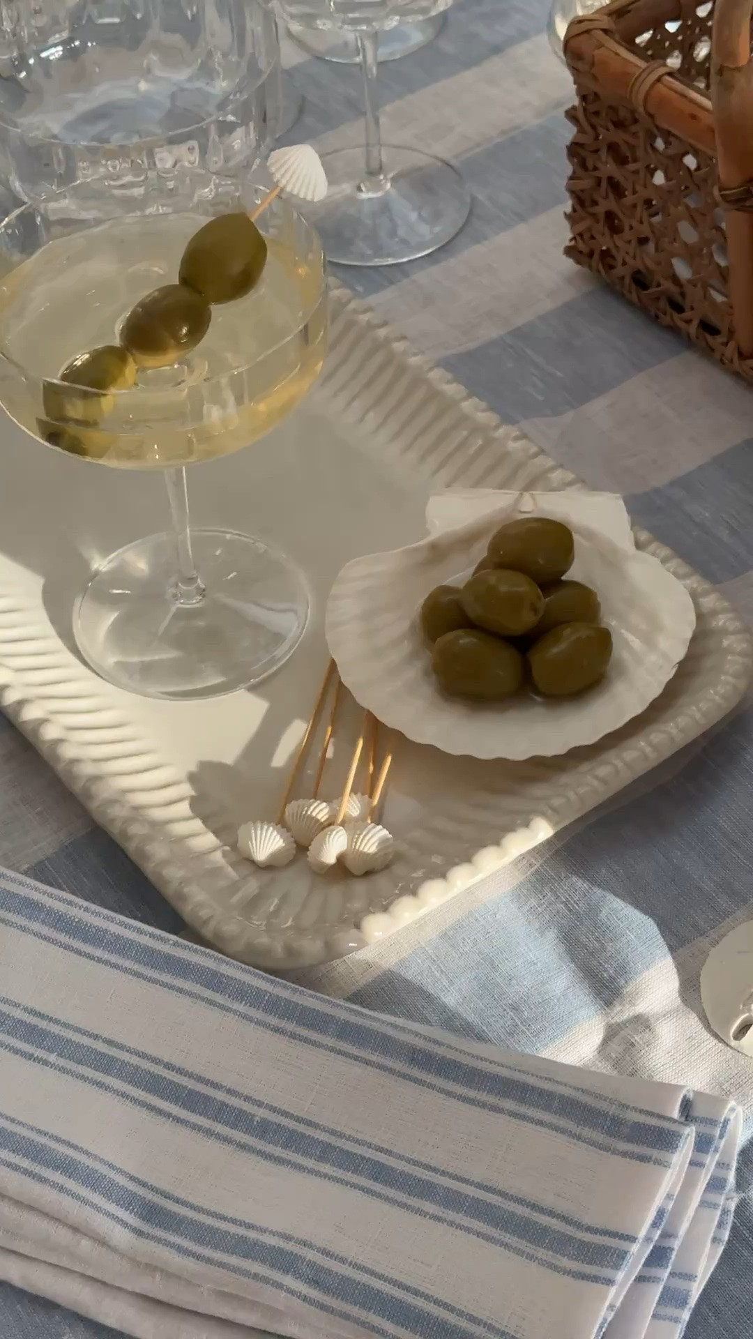 These seashells are a beautiful way to serve olives or even a mini charcuterie, perfect for summer hosting.

Summer Table. Summer Decor. Charcuterie. Appetizers. Seashells. Nautical. Classic Home. Coupe Glasses. LavenderRoseHome.

#LTKHome #LTKSeasonal