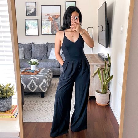get 15% off this jumpsuit with code: JESSM15 💕 i’m wearing this in a size medium, inseam regular. it fits true to size but it’s very long (i’m wearing platform heels in this photo. i should have ordered inseam petite as i’m 5’3”). the jumpsuit has pockets, opaque fabric (no need for a bra), the fabric feels a bit like activewear but it’s hard to tell since the fabric is all black, however, it makes the jumpsuit very comfortable. the straps are not adjustable and it has a side zipper closure  

#LTKStyleTip #LTKFindsUnder50 #LTKSaleAlert