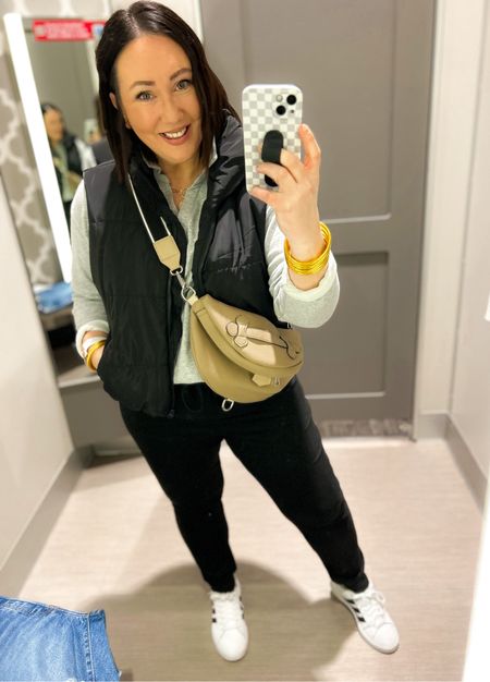 Casual outfit of the day!  XL pullover from Walmart. XL puffer vest from Amazon. Large hacci joggers from Walmart. Adidas sneakers run tts. Favorite sling bag for casual days from Amazon!  

#LTKmidsize #LTKstyletip #LTKfindsunder50
