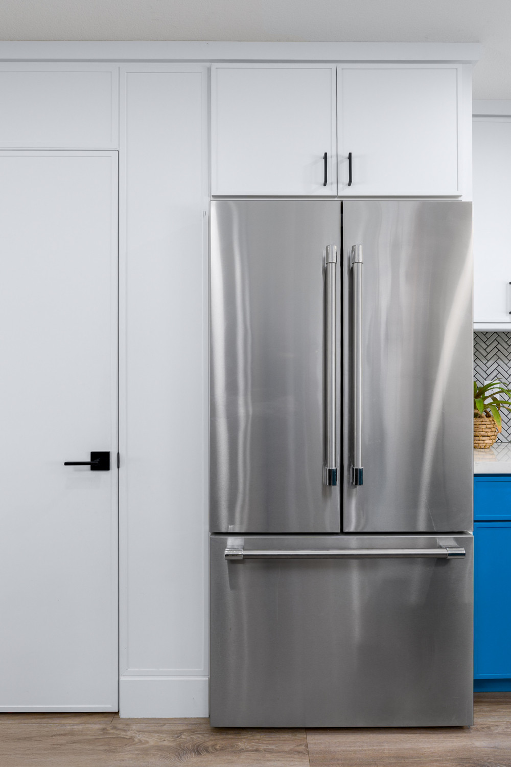 Built-in brilliance. We supplied the custom cabinetry for this modern kitchen remodel, creating a clean, streamlined look that frames the stainless steel fridge beautifully. From full-height pantry storage to upper cabinets with matte black pulls, this setup is all about maximizing function without sacrificing style. The crisp white finish keeps the space bright while allowing the surrounding design elements—like the blue base cabinets and herringbone tile—to shine.

Your fridge deserves a frame this good. Let’s design cabinetry that elevates every corner of your kitchen.

#ModernKitchenDesign #BuiltInCabinetry #FridgeWall #CustomCabinetry #MinimalistKitchen #LTKHome #PinterestKitchen #KitchenRemodel #FlatPanelCabinets #KitchenInspo #DesignBuildFirm #BrightKitchenIdeas #FunctionalDesign #ApplianceWall #InteriorDesignDetails 

 #LTKHome