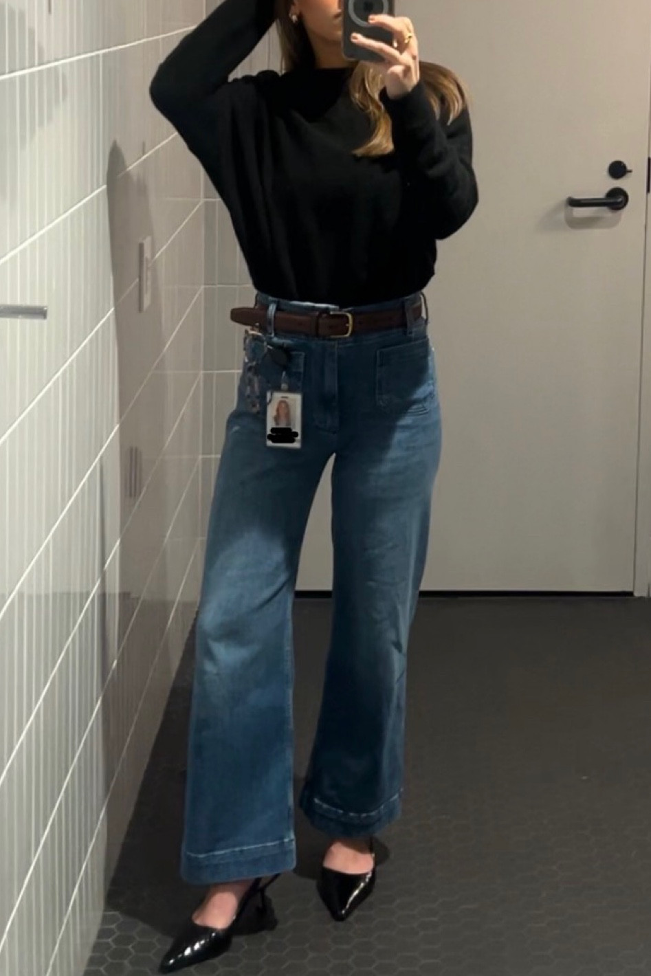 wearing 25 Petite in the jeans, XS in the sweater, and shoes TTS