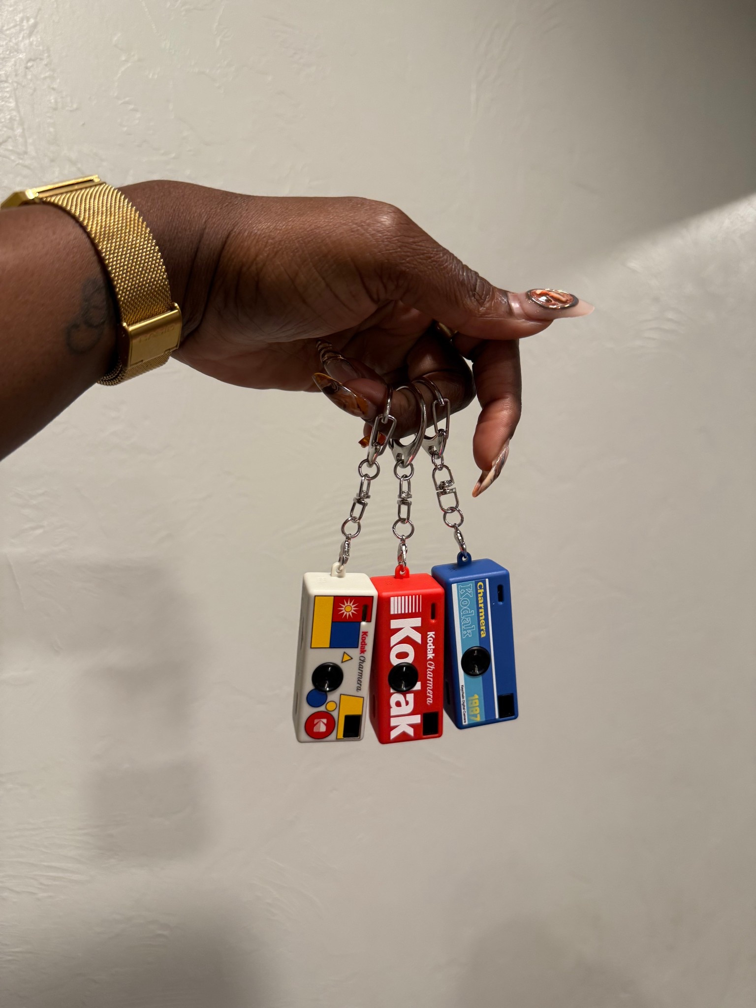 Mini bag charm cameras that take digital photos! I have also included memory card you’ll need and some protective cover options. 