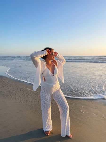 Love this all white beach outfit!

One piece bathing suit, knit beach pants, crochet beach pants, wide leg pants, vacation outfit, beach outfit, linen beach shirt, beach cover up, summer outfit

#LTKTravel #LTKSwim #LTKWedding