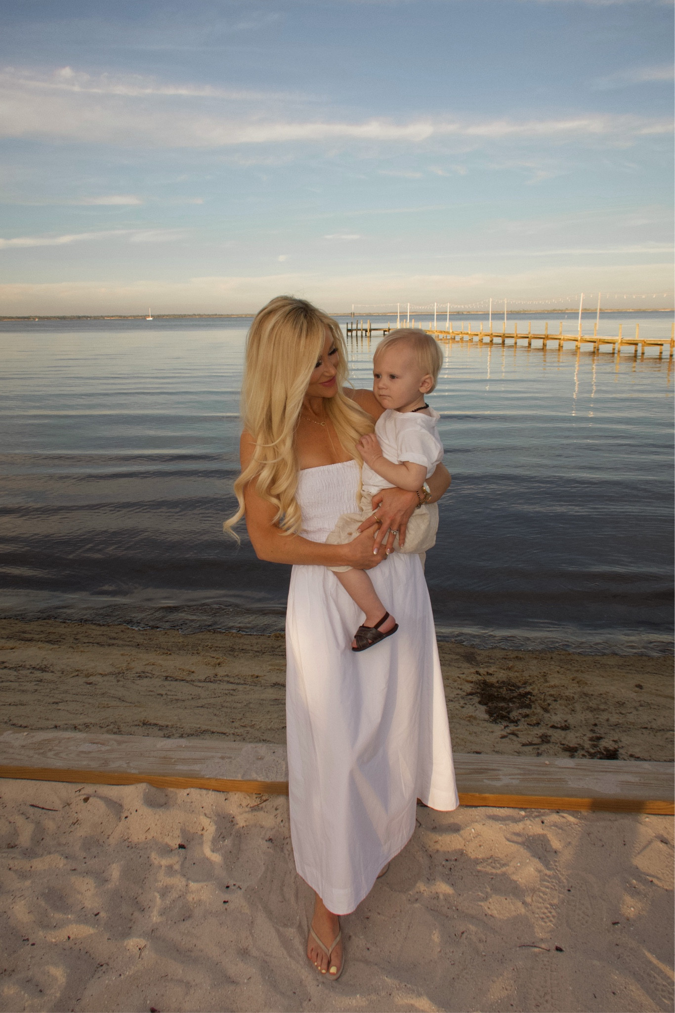 White strapless midi dress🤍 perfect staple dress for spring and summer. Great for family photos | white dress | tube top dress  

#LTKStyleTip #LTKTravel #LTKPetite