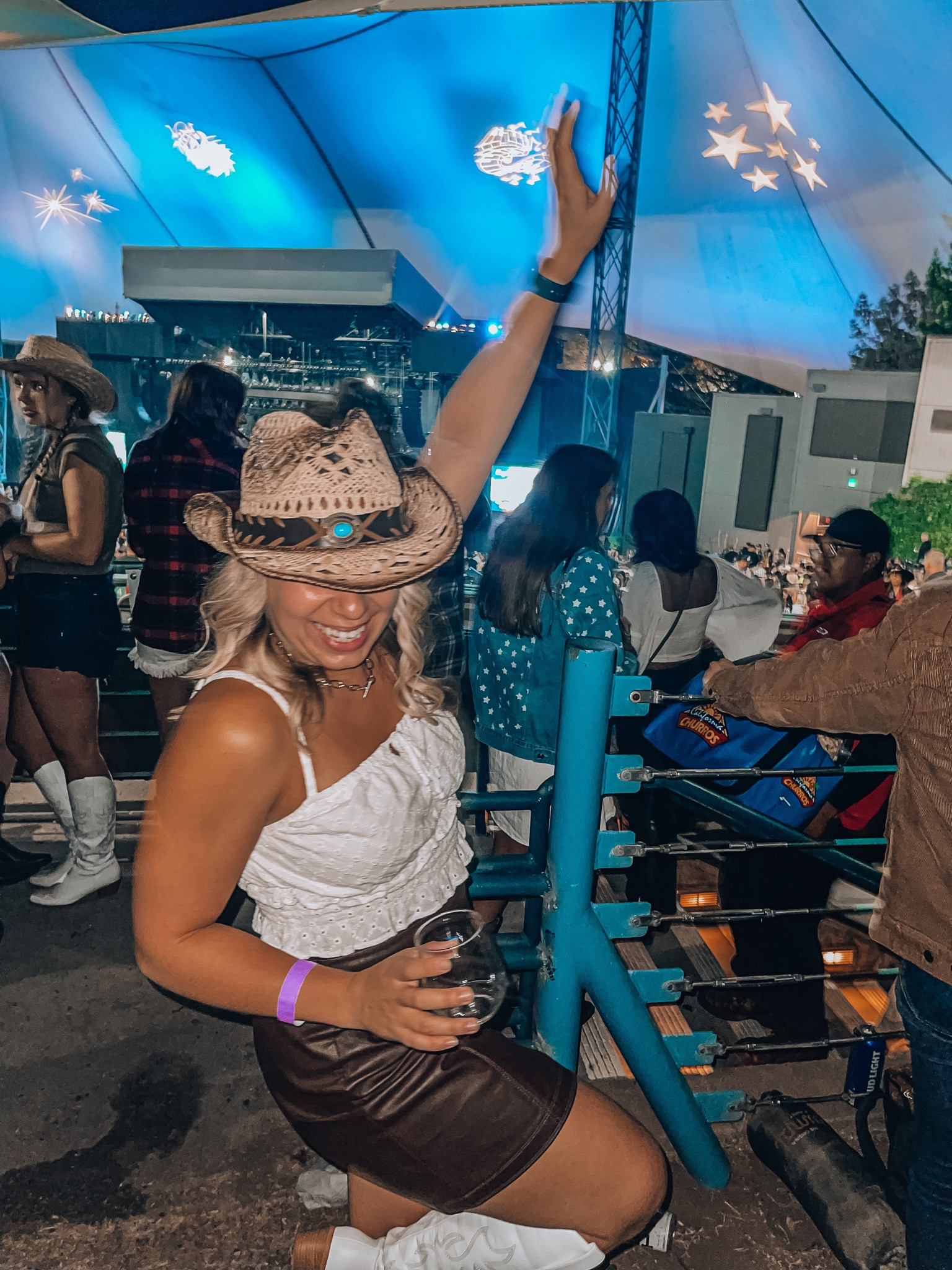 Country concert outfit! Brown leather skirt, cowboy hat, cowboy boots

#LTKshoecrush #LTKstyletip #LTKunder50