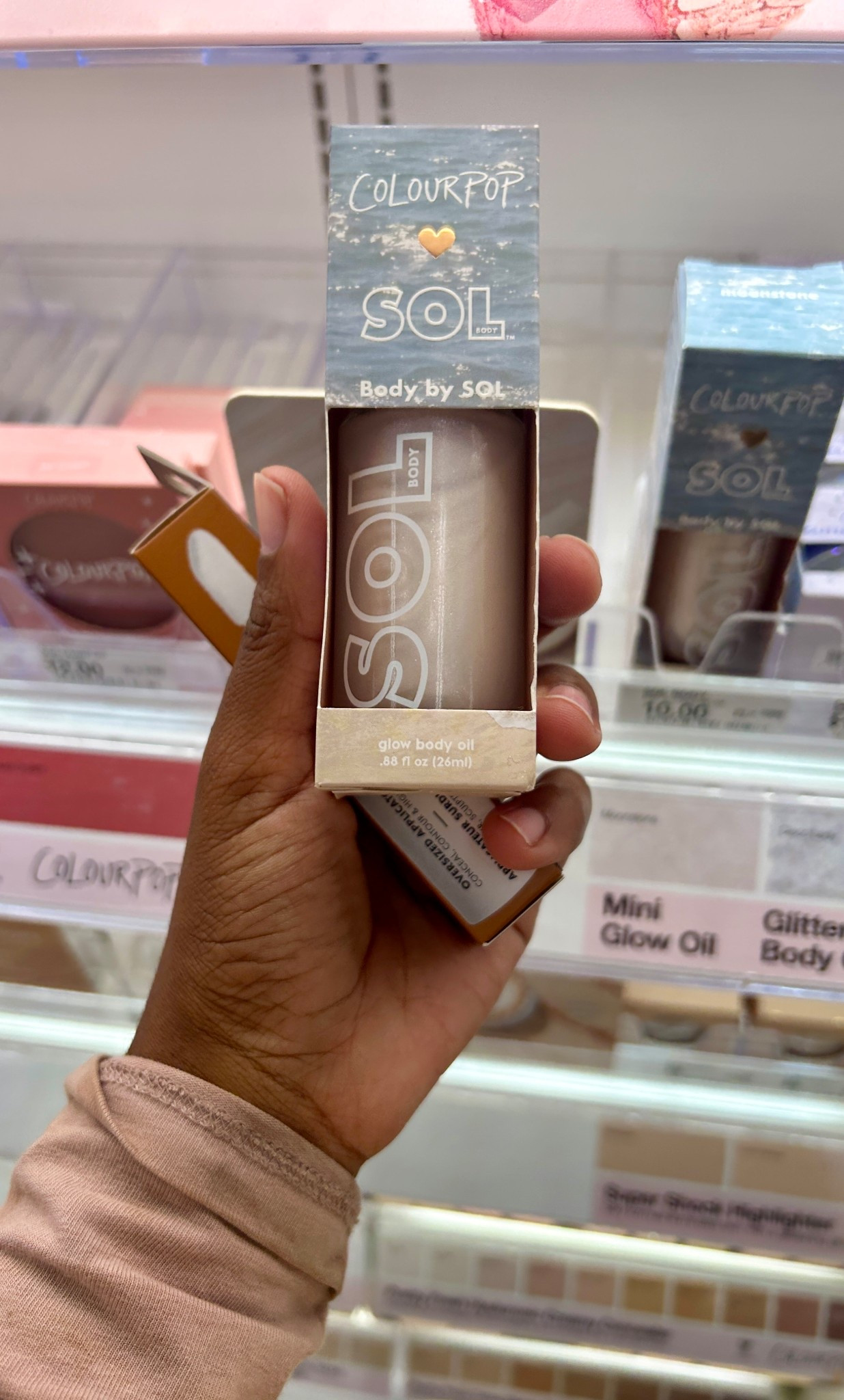 a body glow oil by #colourpop 💫 wondering just how shimmery my skin will look with this? hmm #bodycare #skincareroutine #bodyoil #targetfinds