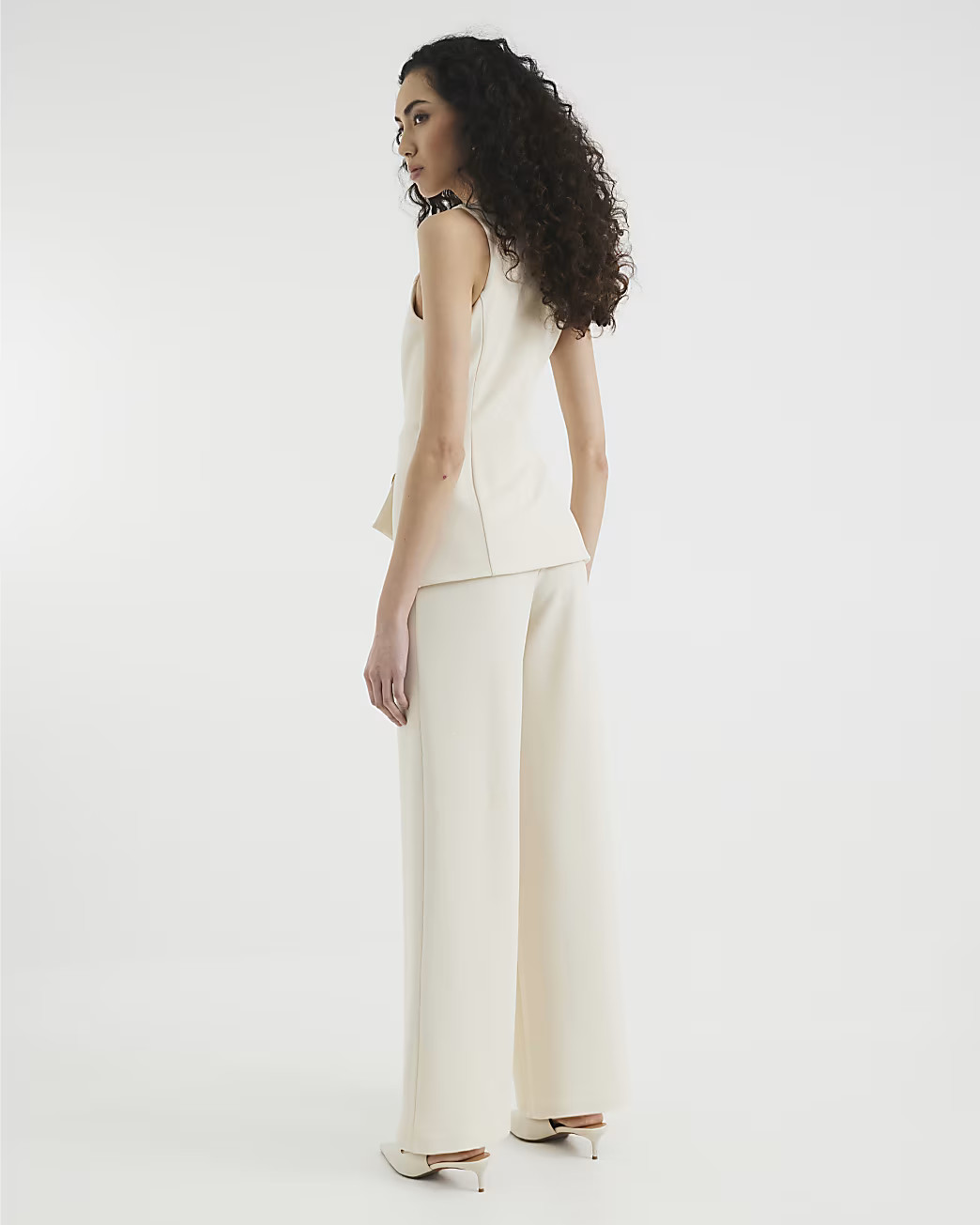 Cream Asymmetric Waistcoat Hybrid Jumpsuit | River Island UK & IE