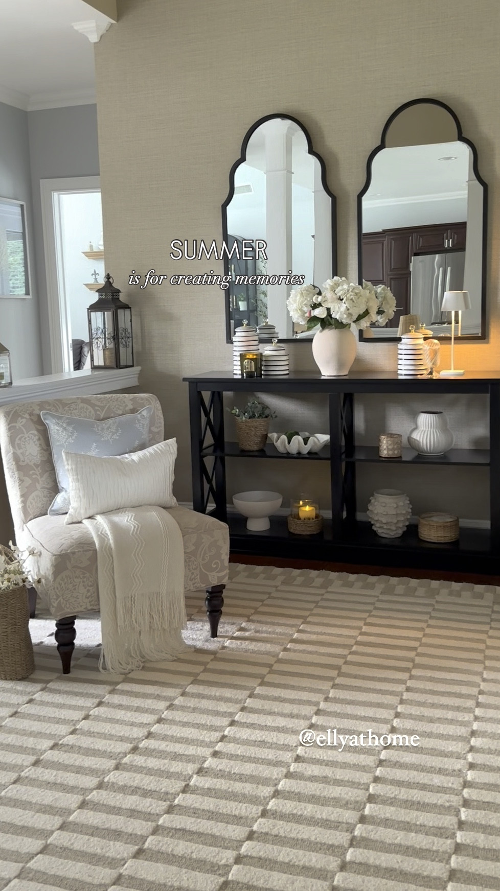 Summer entryway, foyer! Shop my new throw pillows, fringe throw blanket, table lamp, hanging basket on sale, canisters, best selling candle ships free, area rug, side chairs, mirrors, summer home decor accessories. Free shipping. 

#LTKVideo #LTKHome #LTKSaleAlert