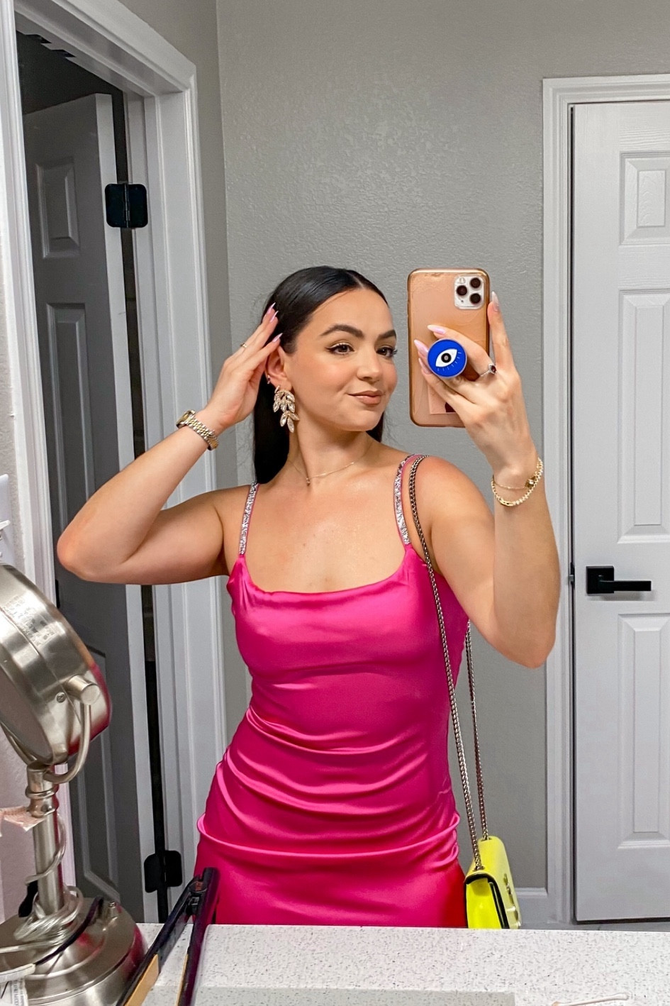 I wore this hot pink silk mini dress for New Year’s Eve. I love the rhinestone sleeves  Hot pink silk dress with embellished straps. Valentine’s Day dress. Valentines outfit. Galentines outfits. Pink dress. Hot pink dress. Bachelorette dress. Girls night out fit. Wedding earrings. Date night outfit. 

#LTKstyletip #LTKSeasonal #LTKfindsunder50