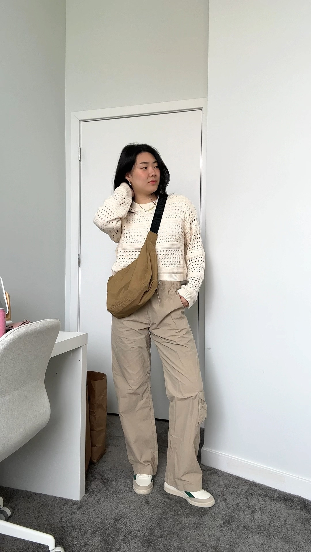 modest beige neutral outfit. crochet top, baggu crossbody bag, djerf ave cargo pants, saye high top sneakers 👟 

#LTKitbag #LTKfit #LTKstyletip