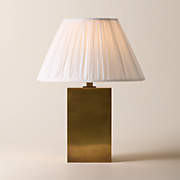 Carmichael Large Aged Brass Table Lamp with Pleated White Shade – Large | CB2