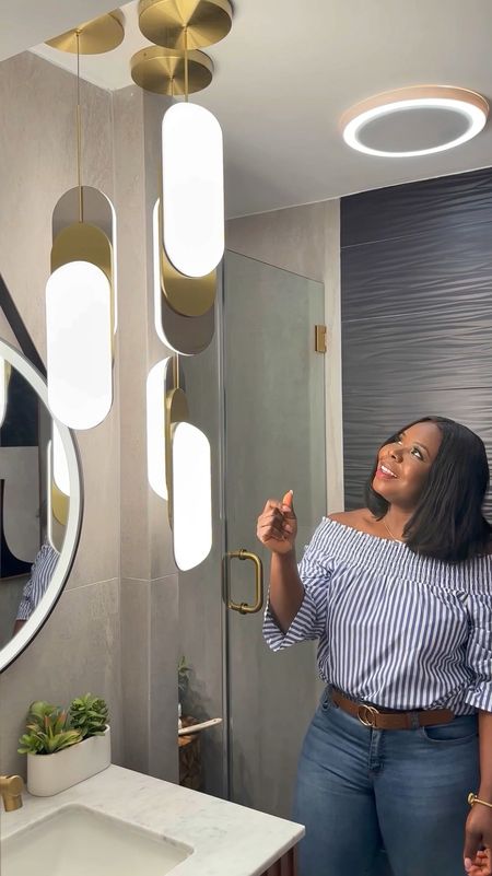 Good light fixture can make a great difference in a space, including the bathroom! Do you agree? Two my favorite accessories in this bathroom are the mirror and beautiful pendent light fixtures, both are from @kichlerlighting #lightgixture #bathroomdecor #bathroommirror

#LTKhome #LTKsalealert #LTKSeasonal