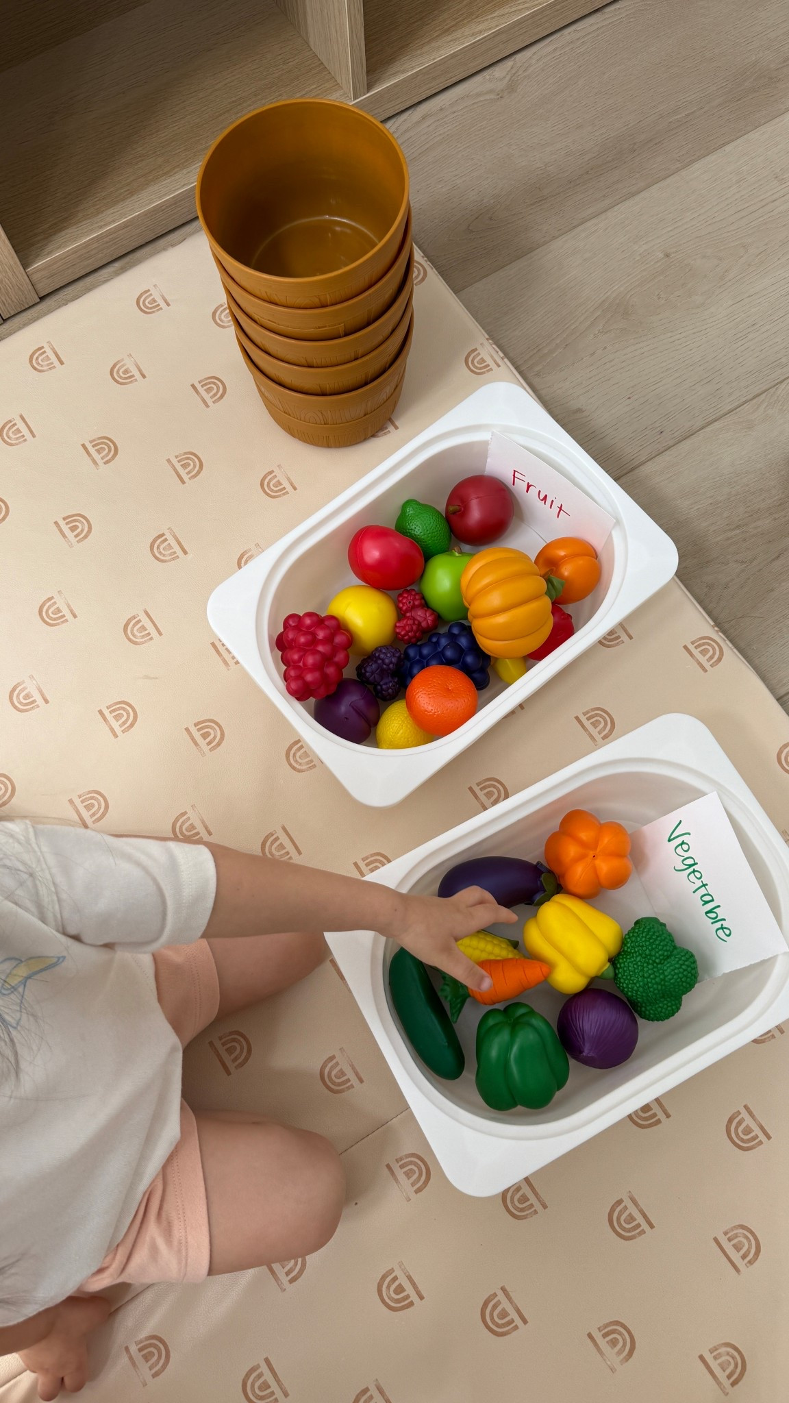 fruit and veggie toys can be used for so many fun learning activities! this one is sorting fruit vs. veggie! #toddleractivities #toddlertoys 

#LTKHome #LTKmomlife #LTKKids