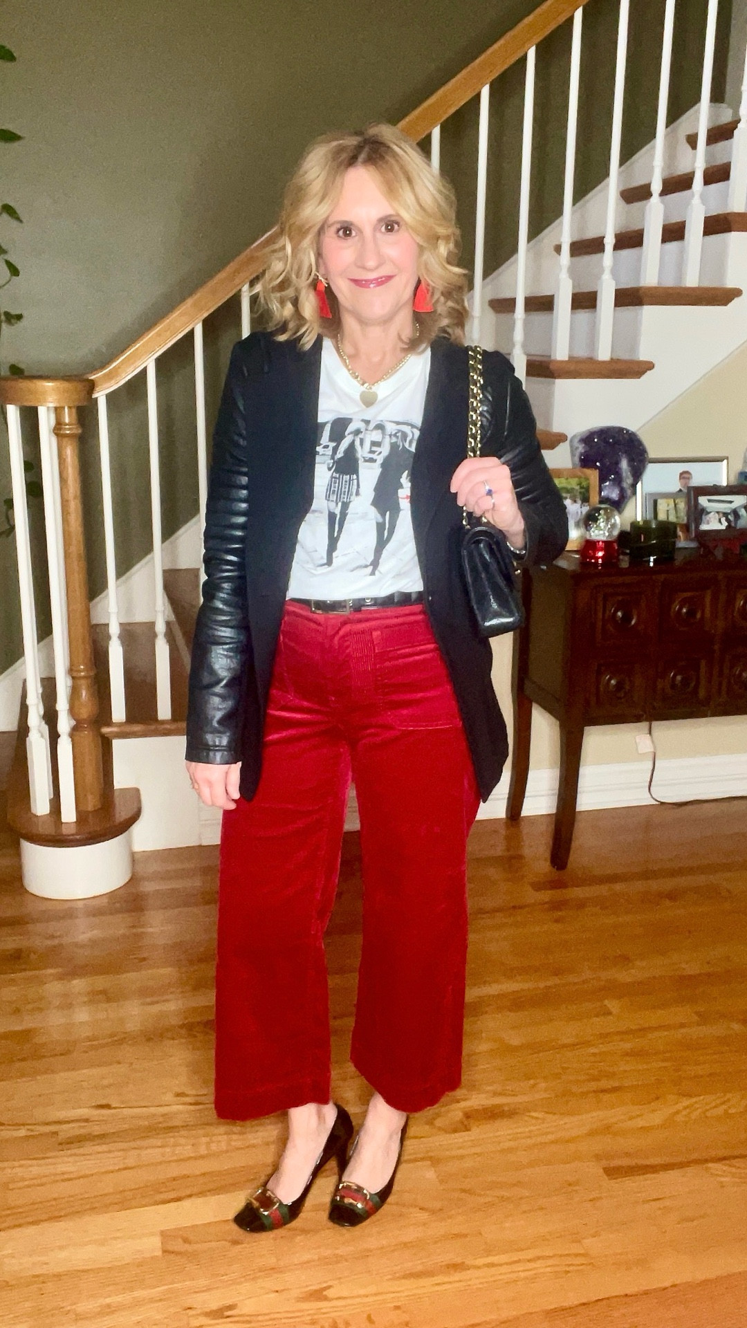 Christmas graphic tee style! Add a leather jacket and pops of red and you are good to go! 

#LTKPetite #LTKOver40 #LTKHoliday