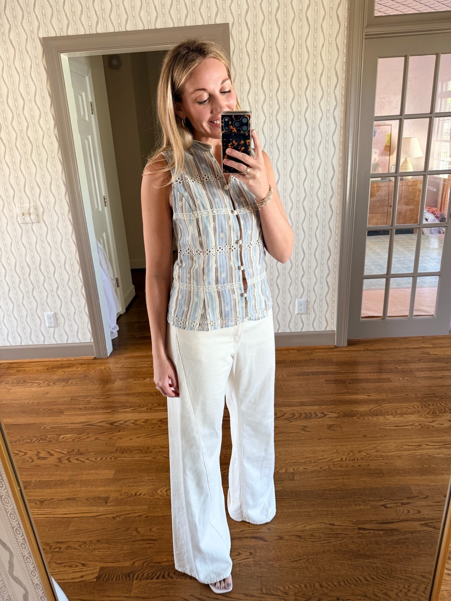 Wearing size 28 in ecru jeans (they run true) and size small in top. Amazon Shoes fit true!