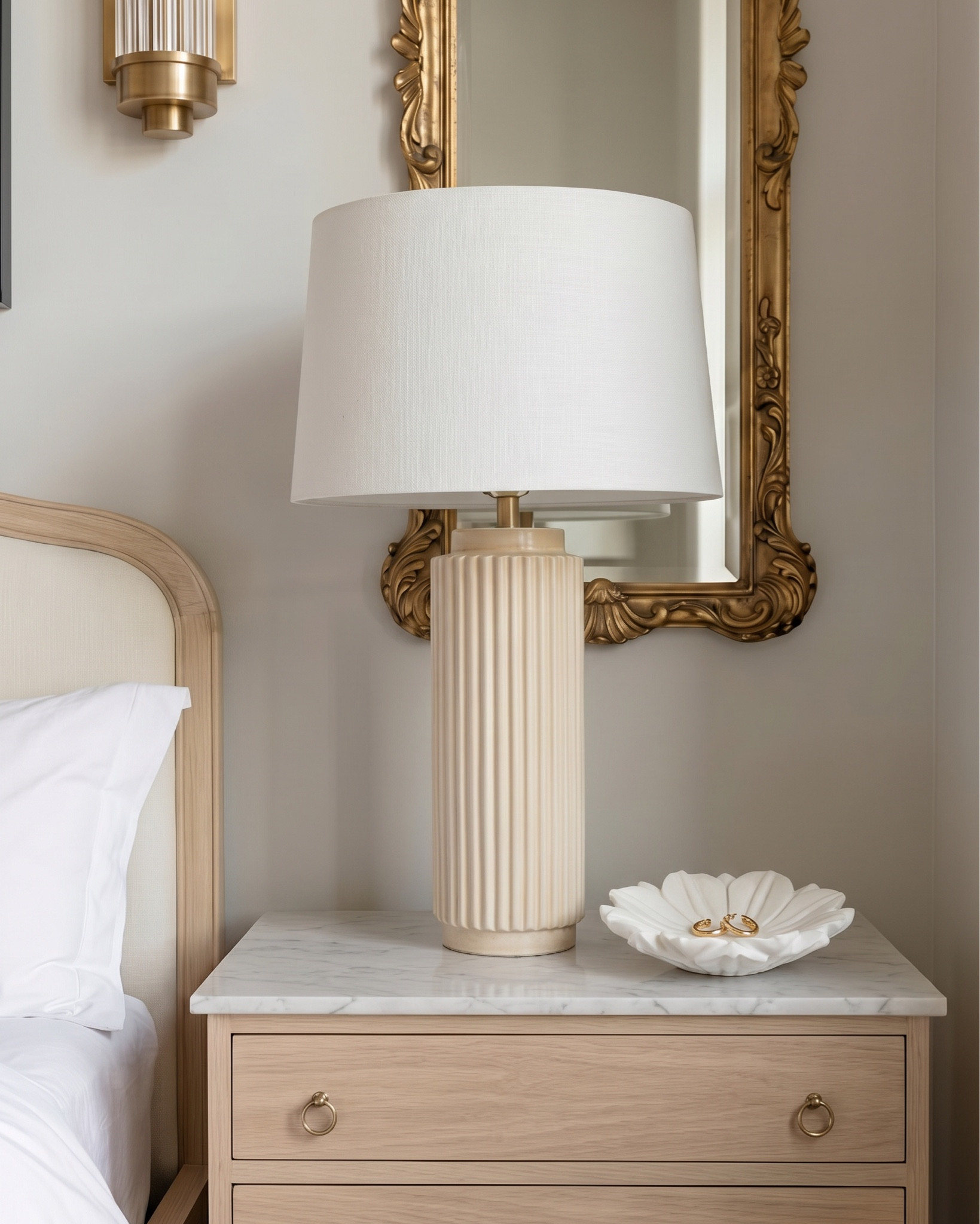 * light wood bed frame
* curved wood headboard
* white bedding set
* cream knit throw blanket
* beige patterned lumbar pillow
* white standard pillows
* boucle bench ottoman
* light wood nightstands
* fluted ceramic table lamps
* white drum lamp shades
* gold wall sconces
* gold chandelier
* vintage gold wall mirrors
* neutral abstract wall art
* beige area rug
* decorative bowl decor
* solid wood dining table
* pedestal dining table base
* cane back dining chairs
* upholstered seat dining chairs
* neutral textured area rug
* gold chandelier lighting
* wood sideboard cabinet
* arched glass cabinet
* ceramic table vase
* floral arrangement centerpiece
* table styling decor


#LTKHome #LTKSaleAlert