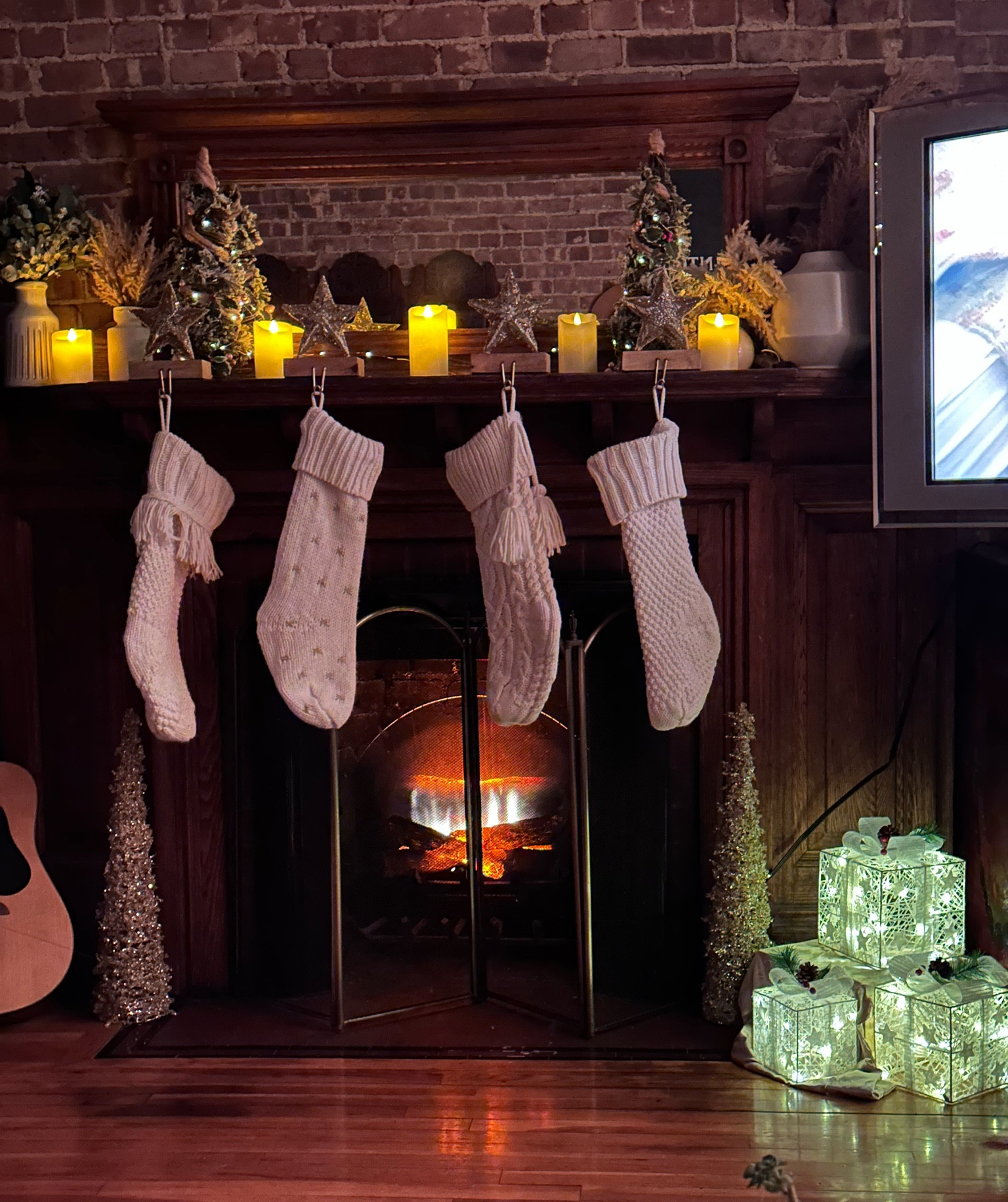 My roomie and I have the coziest Christmas fireplace mantle, apartment decor, Christmas decor, fireplace insert, stockings, battery candles, Christmas tree

#LTKHoliday #LTKSeasonal #LTKCyberWeek