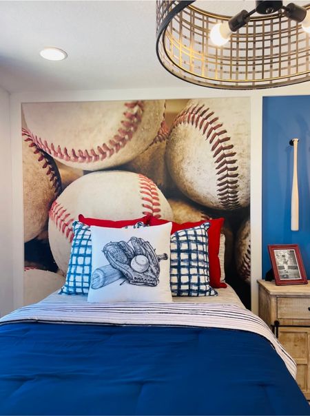 Boys Baseball Bedroom Decor Idea. Baseball Wallpaper with blue comforter and decorative pillows finished with industrial lighting.  #boysbedroom

#LTKhome #LTKkids #LTKfamily