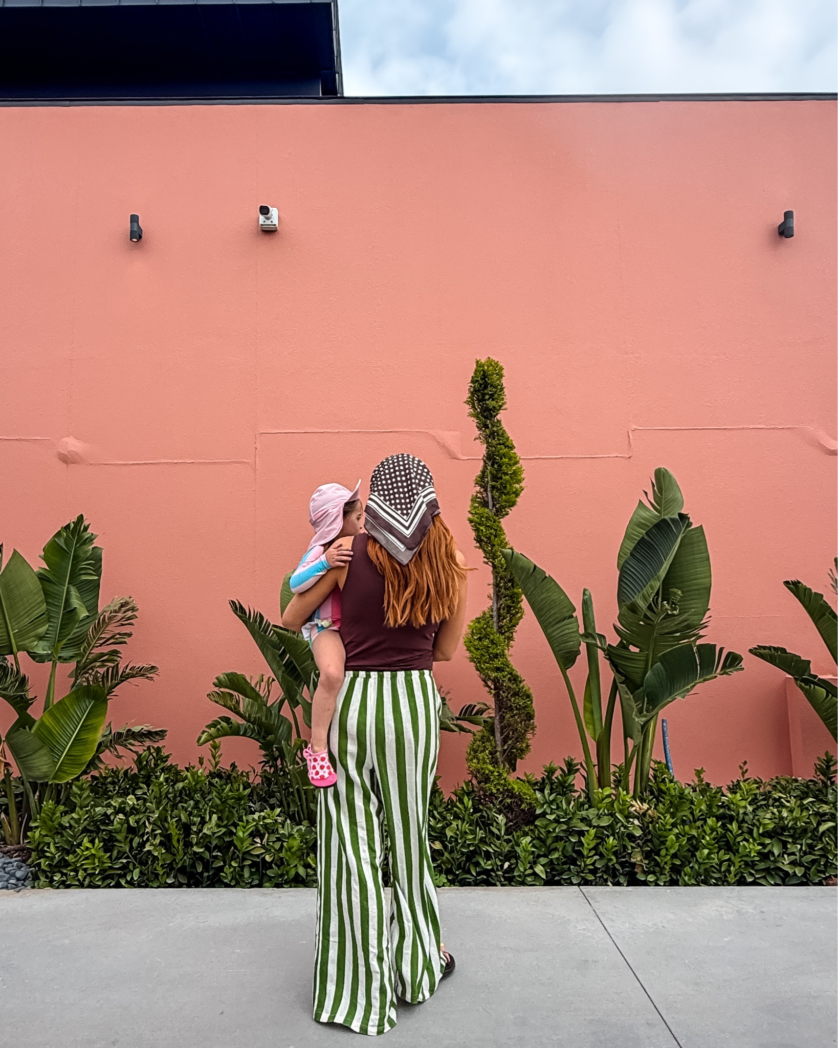 Adoringggg these linen green and white striped trousers for spring/ summer holiday season 🍀 paired with a brown square neck vest (I’ve linked a few options!) and this gorgeous brown head scarf, it’s from next but I’ve also linked similar! 

The  flat brown leather strappy sandals are from nobody’s child 🩴🌞