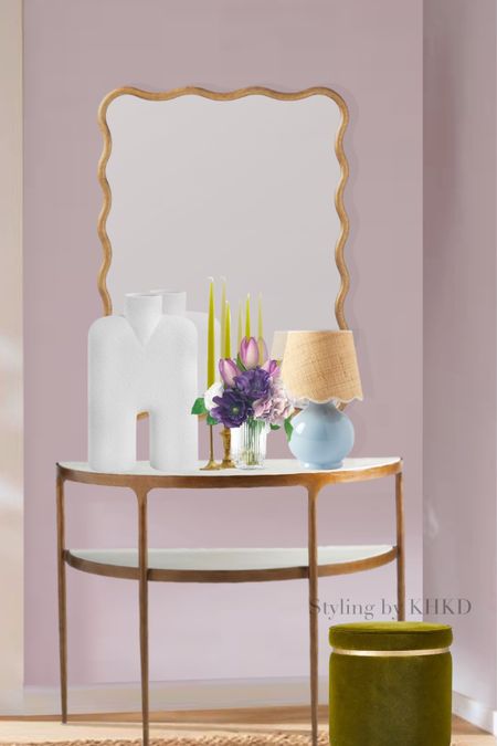 This light-filled entry features the lilac hue on the accent wall. The gilded curved console table and eye-catching waved mirror set the tone for the interiors---clean-lined yet feminine, elegant and glam. The oversized tall white plaster vase brings in an organic note which is relaxing. We are totally in love with this petite blue table lamp with a scalloped edged woven shade. The beauty is all in detailing. As usual, we always incorporate our favorite taper candles and flowers to give this vignette a final refined touch. Now 20% off at Serena&Lily with code SPRING. #entrystyling #springdecor 

#LTKsalealert #LTKhome #LTKFind