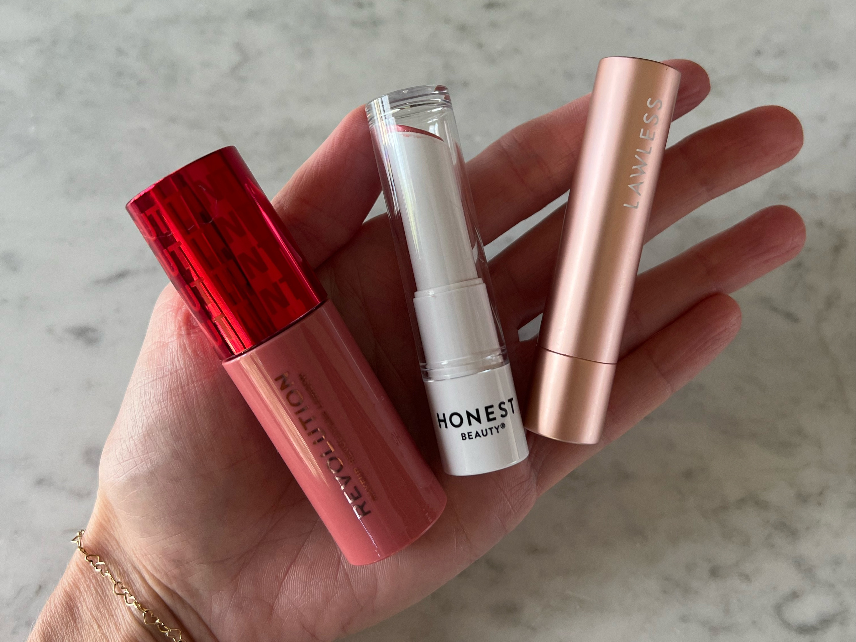 Favorite new lip colors since discovering that I’m a light spring 🌞 
Pout tint in sweet pink , honest tinted balm in summer melon & lawless balm stick in Cupid 💘 

#lipcolor #lightspring #blondemakeup 

#LTKBeauty #LTKFindsUnder50 #LTKStyleTip