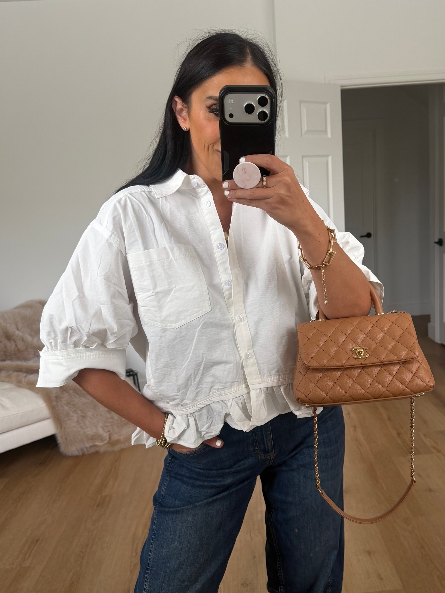 Dressy Casual Blouse Top with Ruffled Sleeves.
Any size, multiple colors 
The Ultimate Barrell Leg Jeans