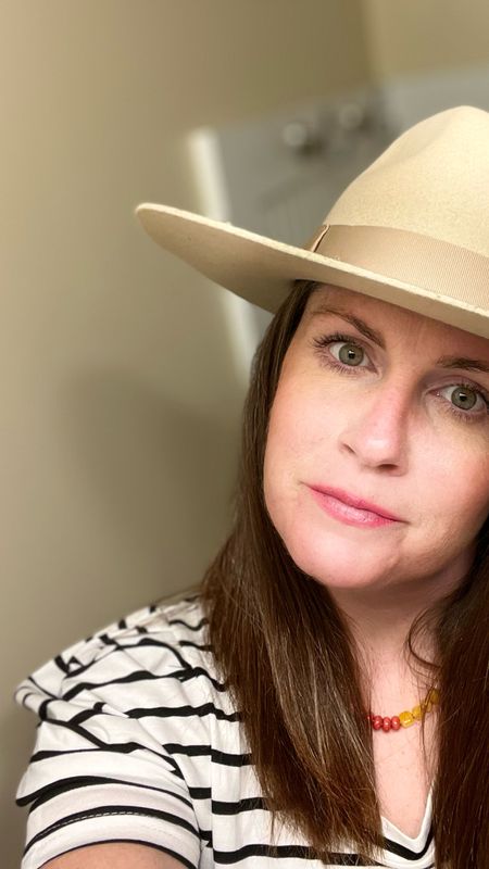 Great striped shirt for spring days. Puff sleeves. Great hats. Colorful necklace. Fun accessory gift ideas for any lady in your life  

#LTKSeasonal #LTKGiftGuide #LTKover40
