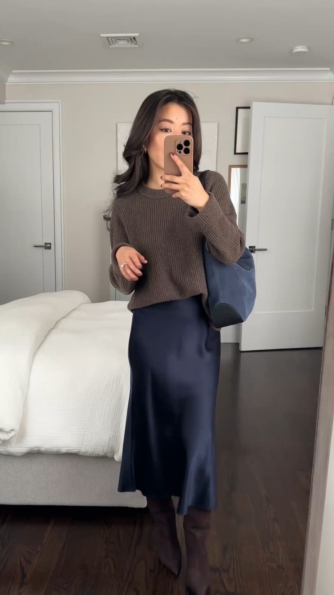 Fisherman ribbed crewneck sweaters = the best layering staples. 

I now own these thick, cozy knits in several colors! I wear the gray one the most. Very good value for 100% cashmere. And if you prefer cotton, this same sweater is available in 100% organic cotton for under $50 (linked under similar) 

• Signature Quince Fisherman Crewneck Sweater in brown xs. A thicker rib knit, with a relaxed fit on me with sleeves folded once. I tuck this sweater using my DIY elastic tuck band method or using a hidden skinny belt

• 100% silk midi slip skirt Xs - I’ve also had the champagne color for a few years now which is beautiful in person. Fabric on the thinner side. The xs skirt measures 22.5” across the waist (elastic) and 28 to 29” in length 

• Schutz Maryana Sculpt boots size 5 
Linked similar with lower heel available in diff calf widths 

• Old J. Crew bag

Petite work wear , fall office style 

#LTKPetite #LTKFindsUnder100 #LTKWorkwear