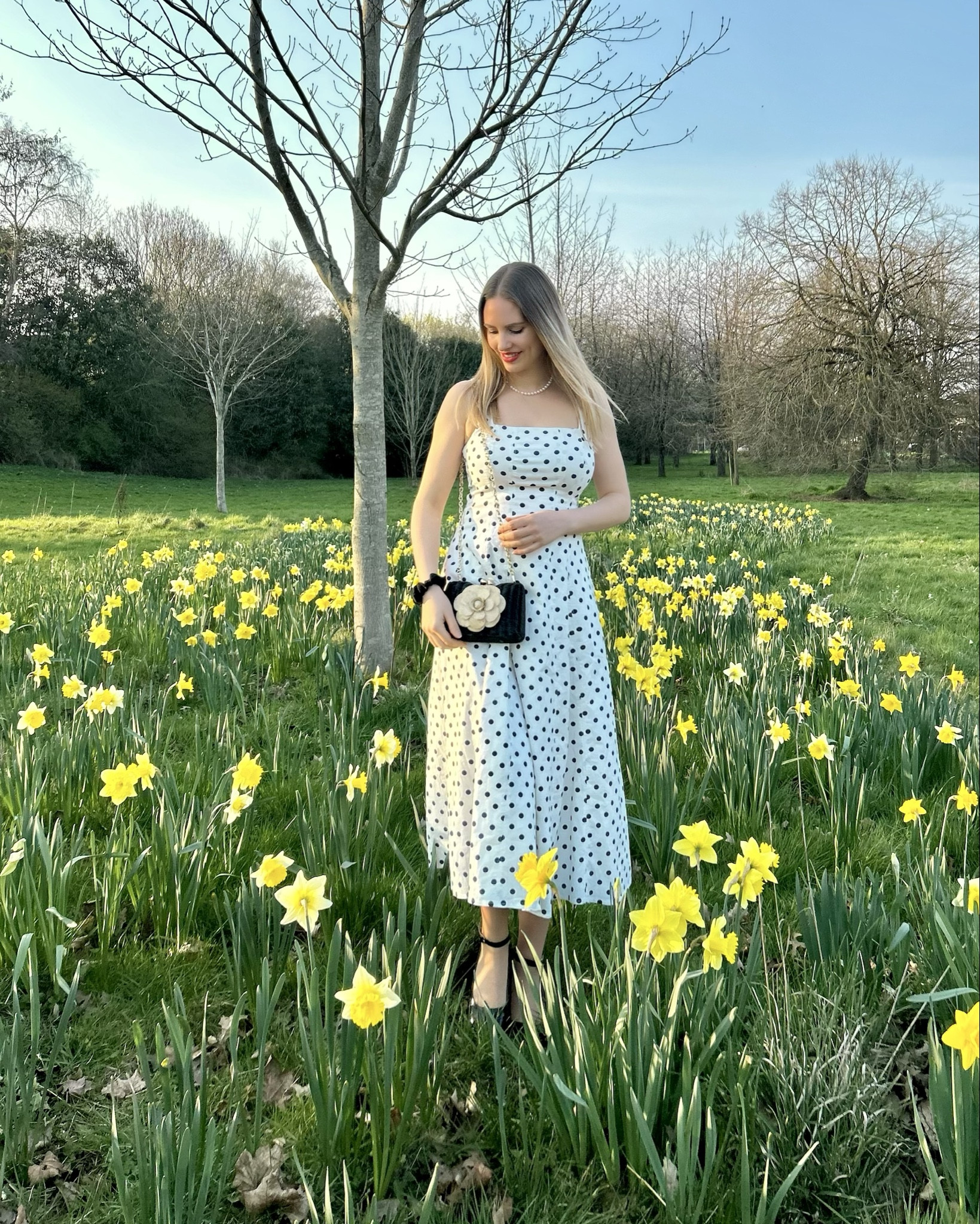 Golden hour golden flower 🌼💛

Cotton polka dot dress by @abercrombie 
Raffia camellia bag by Serpui 

#springvibes #flowers #springdress #polkadots #naturelover

#LTKdresses #LTKspring #LTKstyletip