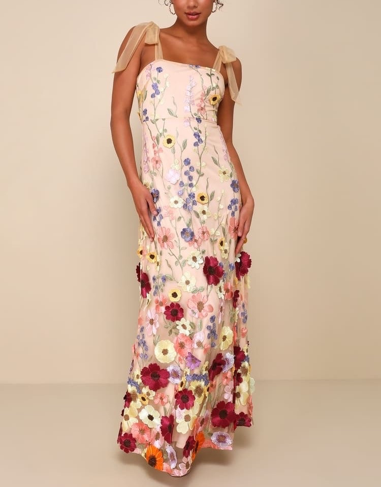 With its sculpted floral embroidery and flowing maxi skirt, this dress balances structure and softness beautifully. The tie straps add a delicate, adjustable touch that enhances its romantic feel. Under $150.

Keywords:

* blush maxi dress
* 3D floral maxi dress
* embroidered maxi dress
* tie strap maxi dress
* floral occasion dress
* wedding guest dress
* garden party dress
* romantic maxi dress
* feminine occasion dress
* spring maxi dress
* blush floral dress
* elegant maxi dress
* engagement party outfit
* brunch outfit inspiration
* countryside style dress
* special occasion dress
* vacation dress
* ethereal dress
* floral embroidery dress

#LTKootd #LTKgrwm #LTKTravel