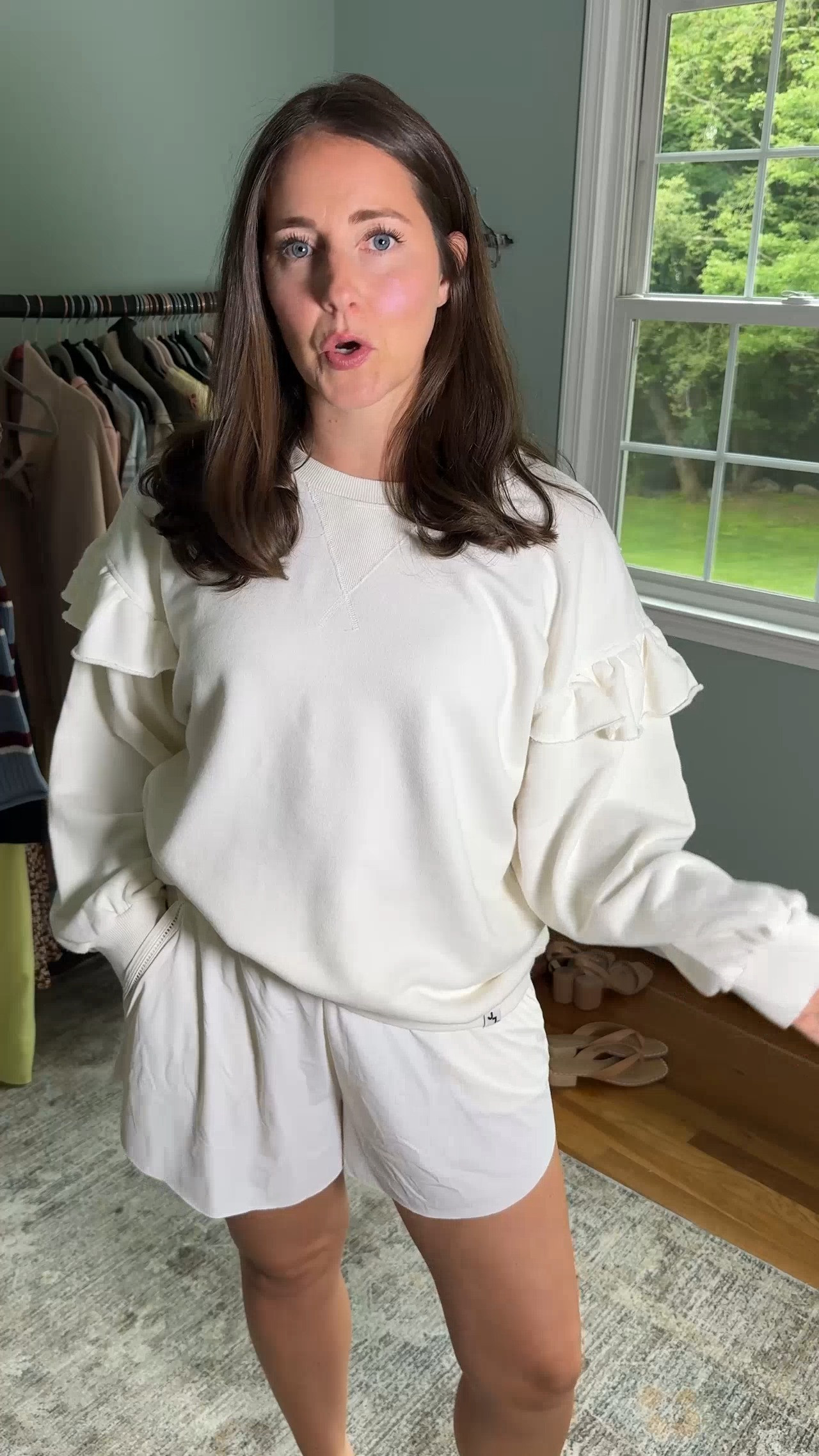 How fun are the ruffle sleeves on this sweatshirt?! I love the fit of it too! comes in other colors.

wearing size M in the sweatshirt & shorts  

 #LTKootd #LTKmomlife