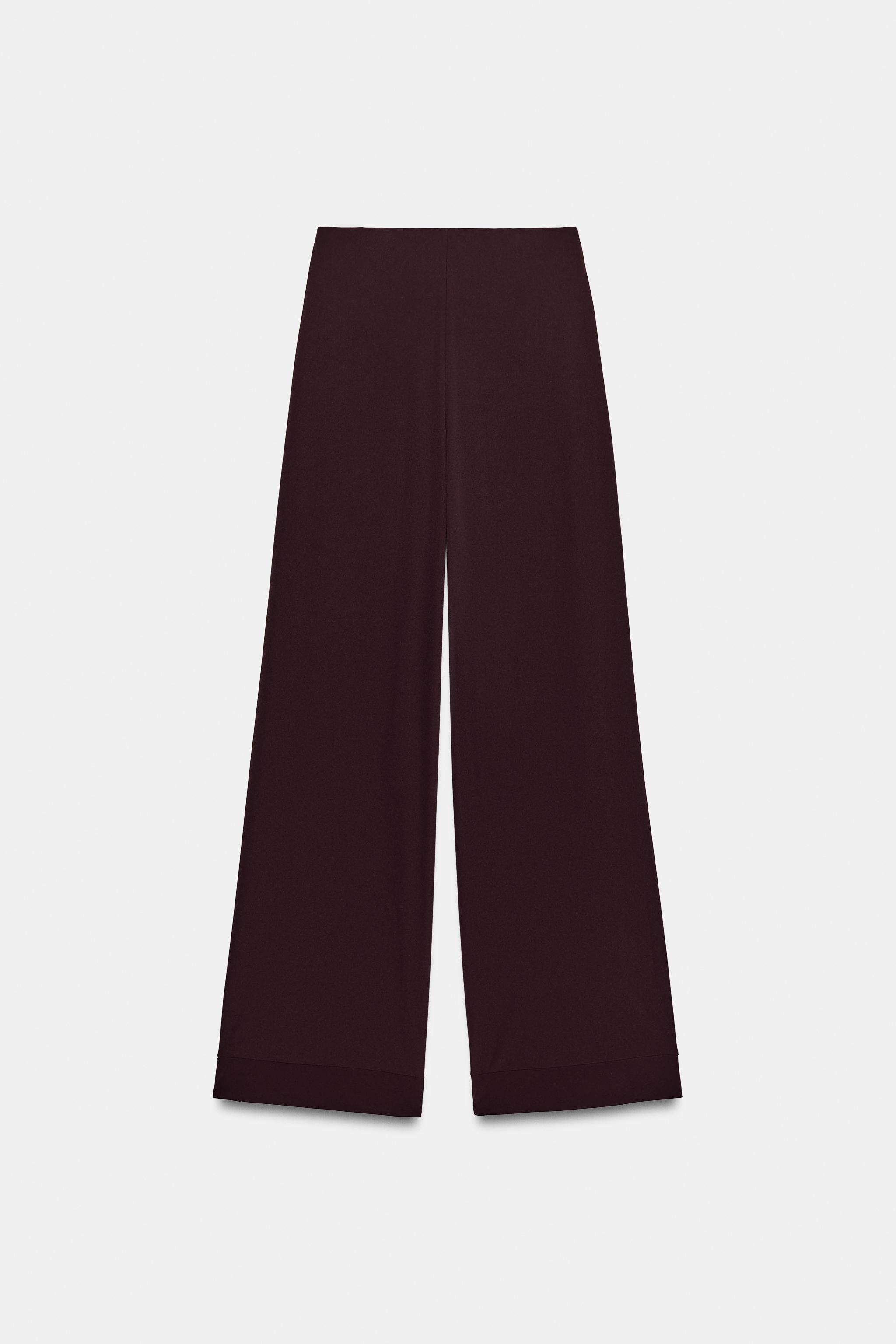 Pants made of flowy fabric. High waist with elastic waistband. Wide leg. | Zara US