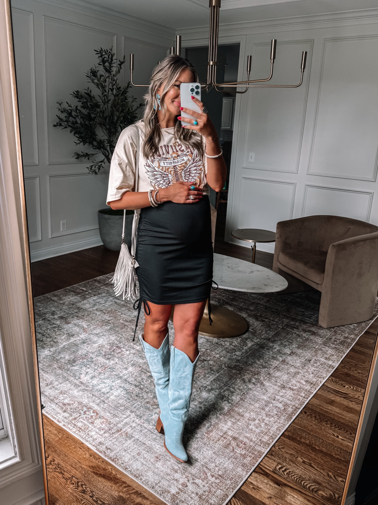 Amazon country concert outfit idea! Non/maternity but bump-friendly! This dress has a ruched drawstring sides so you can adjust the length and I love the oversized graphic tee! The western boots are so comfy! 

Sizing info at 27 weeks pregnant:
Tee sized up to large
Dress sized up to medium 
Boots sized up a full size 




#LTKfindsunder50 #LTKbump #LTKstyletip