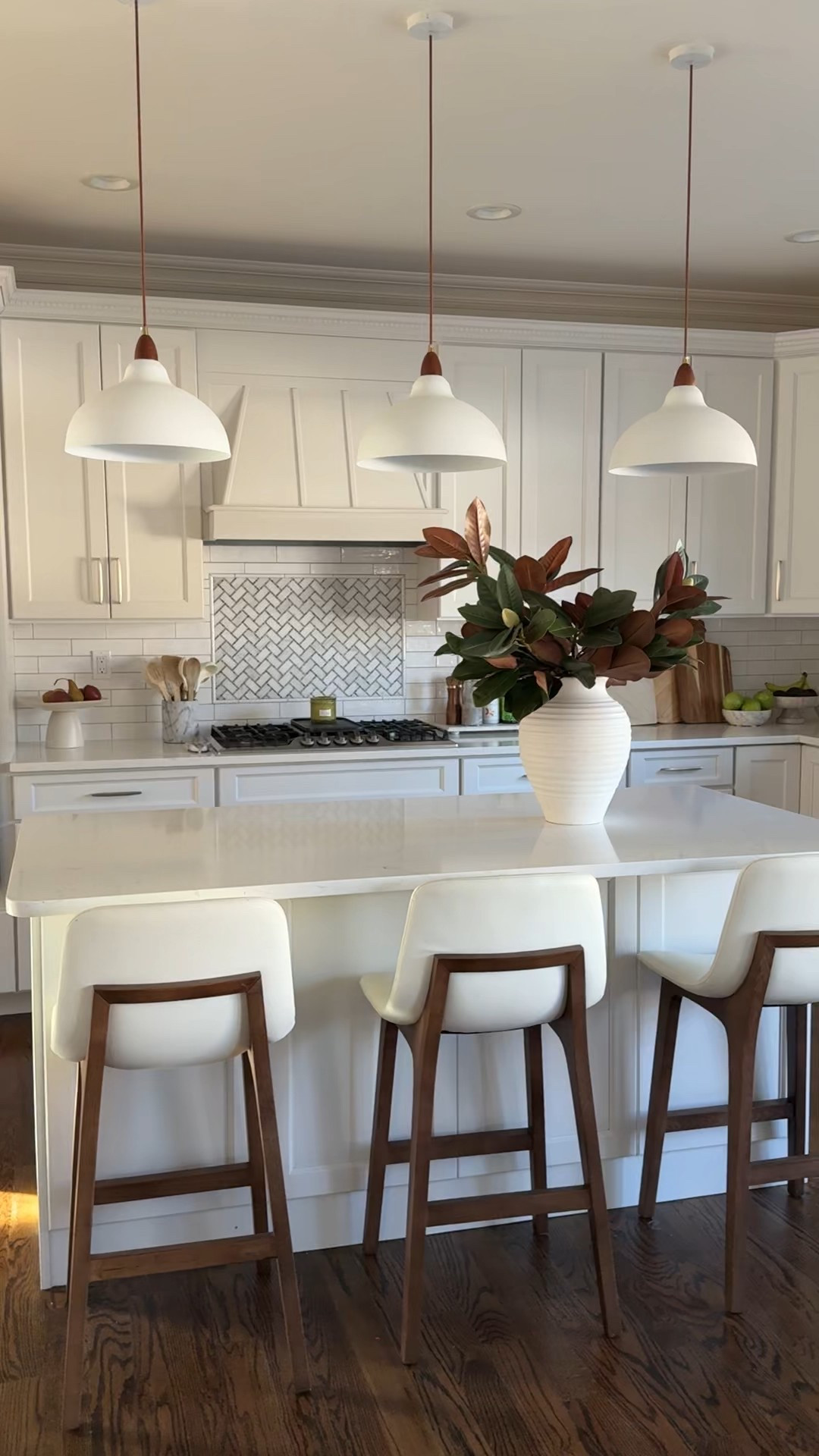 Looking for an easy transition? These magnolia stems are gorgeous

#whitekitchen #kitchen #barstool #pendents #kitchencounter #cutting boards

#LTKSeasonal #LTKFindsUnder50 #LTKHome