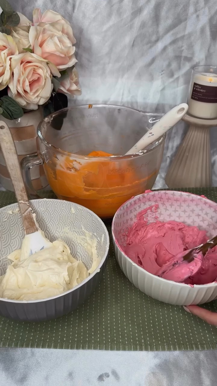 One my most favorite parts of making buttercream is mixing colors, specifically having to understand color theory to get the shade you want.
.
Food Colors Used:
💖For the Pink-
• 115 Enco Bright Pink
• 1849 Enco Dark Brown
• 2440 Enco Super Red
🧡For the Orange -
• 115 Enco Bright Pink
• 2392 Enco Orange
.
Ingredients:
*  2 cups (4 sticks) of unsalted butter
*  1 (15oz) can of sweetened condensed milk
*  1 teaspoon of salt
*  1 teaspoon of vanilla extract
Instructions:
1.  In a stand mixer, mix the softened butter on medium speed for 10 minutes, scraping the bowl occasionally.
2.  Empty the can of sweetened condensed milk into the mixer and mix until well incorporated.
3.  Finally, add in the vanilla extract and salt and give the buttercream one last good mix.
4.  Use to decorate your cakes and store extra in an airtight ziplock bag for up to 8 weeks in the fridge.
.
#buttercreamrecipe #bakingrecipe #russianbuttercream #cakedecorating #heartcake