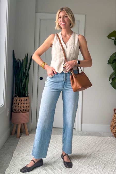Try this elevated spring uniform from Madewell!  a linen vest, wide leg jeans, ballet flats + crossbody bag 

wearing size 4 vest, size 27 tall in the jeans (I’m 5’10” for height reference) 

#LTKxMadewell #LTKOver40 #LTKFindsUnder100